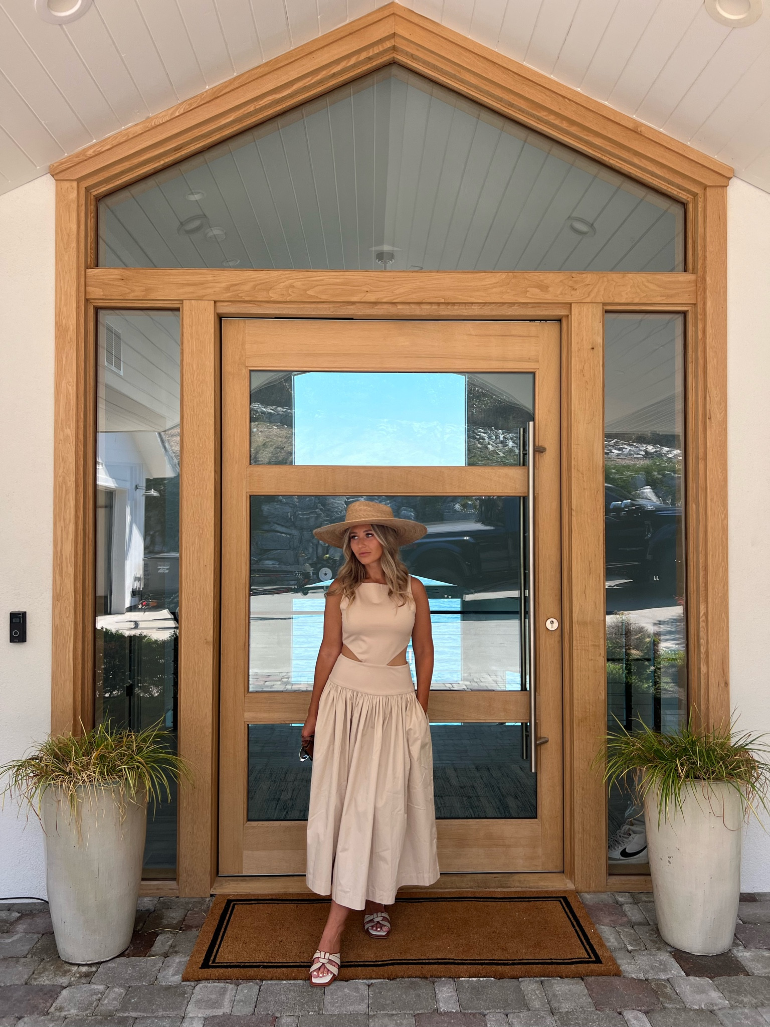 Midi dress in light beige. Revolve dress by Marianna Hewitt . Paloma hat lack of colours. Beige sandals. 

#LTKBacktoSchool #LTKOver40 #LTKxNSale