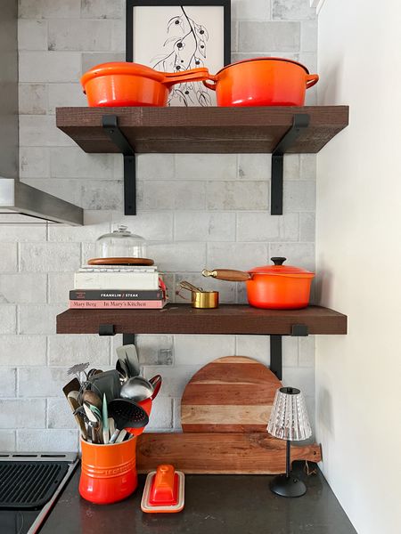 Kitchen Shelf Decor, cutting boards, Le Creuset handles, artwork, battery lampps

#LTKhome