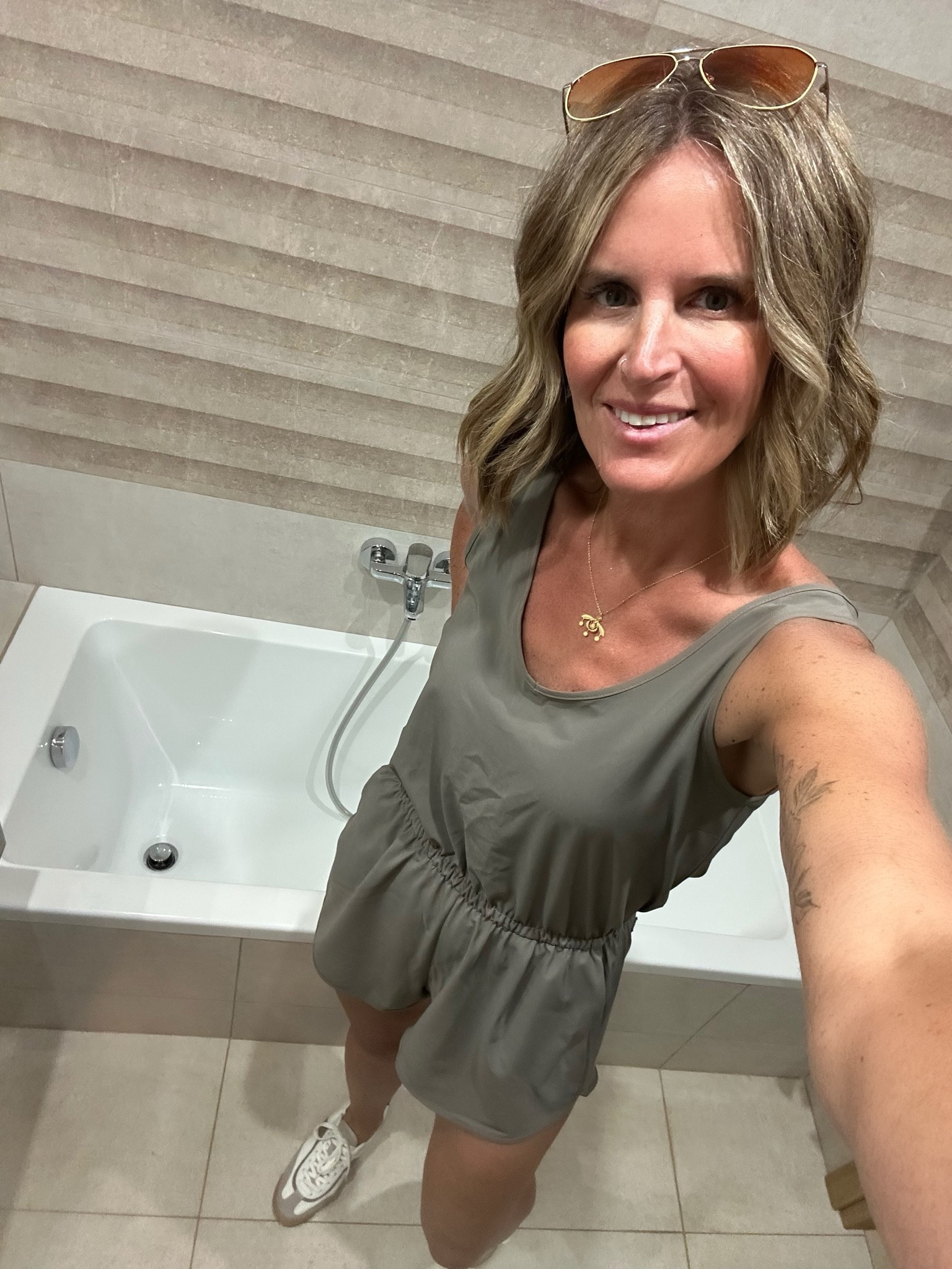 The perfect travel outfit ✈️ Comfortable, lightweight, easy to pack, and cute enough for wherever the day takes you. This Vuori romper has earned a permanent spot in my suitcase. I am wearing a size small  5’9:138lbs🤍 #travelstyle #over40style #vuori

#LTKTravel #LTKootd #LTKOver40 #LTKTall