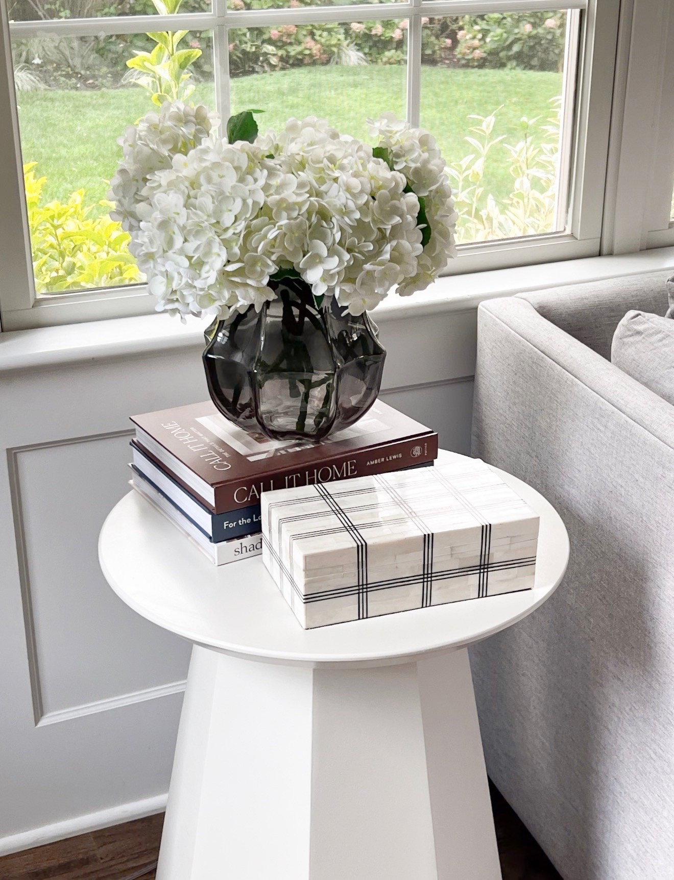 These faux hydrangeas are one of my most complimented Amazon home finds. They look incredibly realistic, add softness to any space, and never need watering. Styled in this smoky glass vase with a stack of coffee table books and a decorative marble box, they create an effortless look that works year round.

Amazon home finds, faux hydrangeas, decorative vase, coffee table books, marble box, living room decor, side table styling, neutral home decor, traditional home style, Amazon decor finds, girlonthehudson

#LTKActive #LTKSeasonal