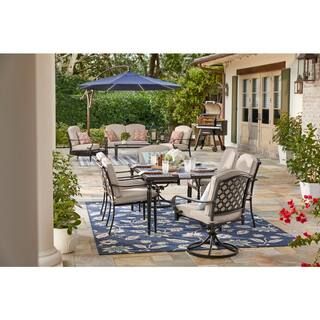 Hampton Bay Laurel Oaks 7-Piece Black Steel Outdoor Patio Dining Set with CushionGuard Putty Tan ... | The Home Depot