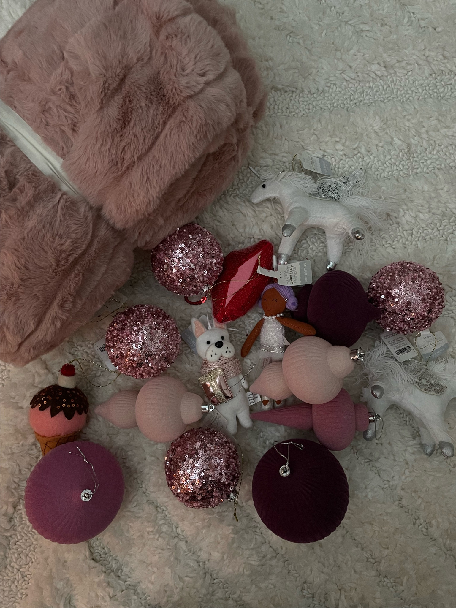 Pink Christmas ornaments. Faux fur throw. 

#LTKHoliday #LTKSeasonal