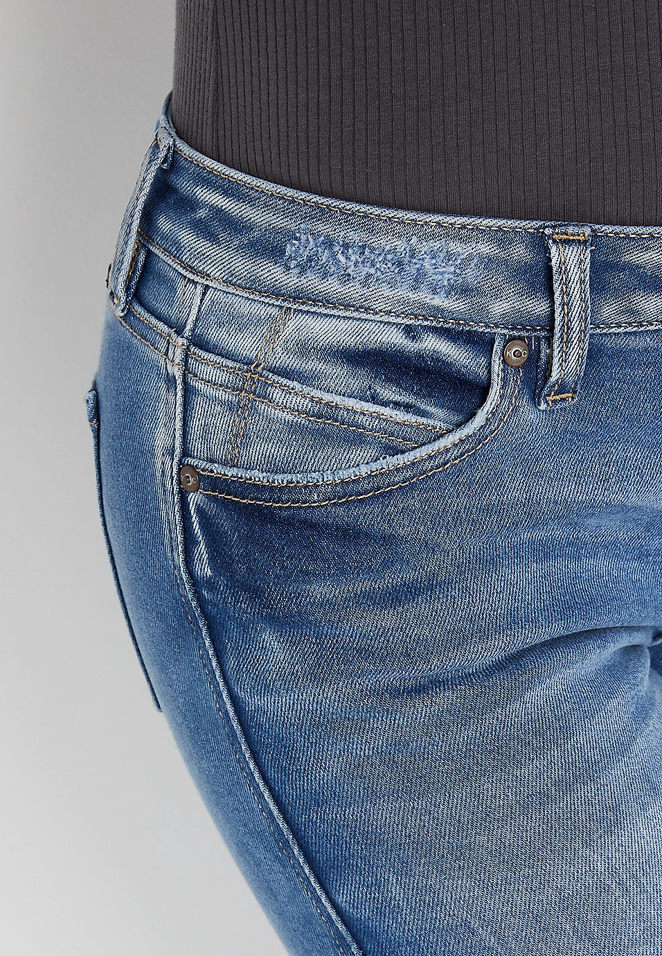 KanCan™ Skinny Mid Rise Ripped Hem Jean | Maurices