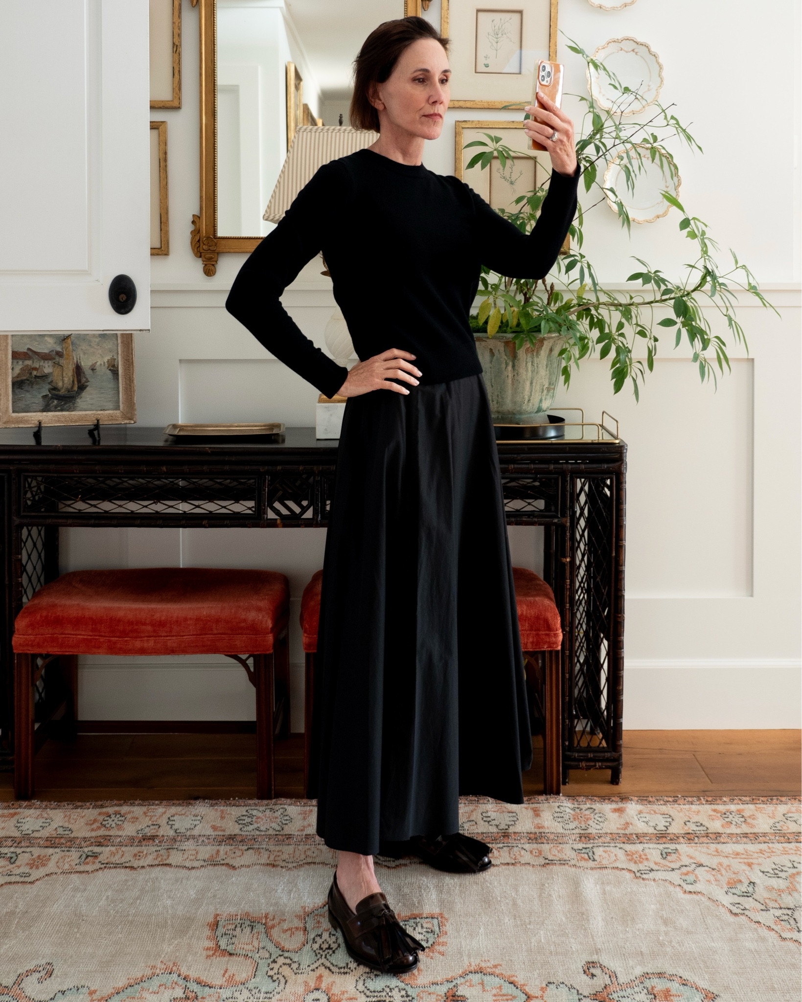 All black with brown loafers. Same black skirt as before but adding a little more warmth with a cashmere sweater. From Vince - sized down so I could wear with full skirts or high waist trousers. Love the combo of all black with brown shoes. The funkiness of the floppy tassel is an added bonus. ⁠

#LTKStyleTip #LTKSeasonal #LTKShoeCrush