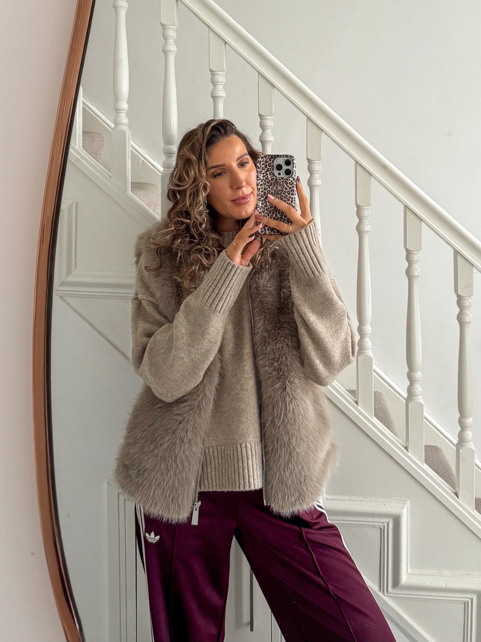 Cosy autumn outfit for the weekend 🍂

Adidas loose Firebird track pants in burgundy with the most perfect oversized neutral crew neck jumper, faux fur gilet , burgundy new balance trainers and burgundy crossbody bag 

#LTKeurope #LTKautumn #LTKuk