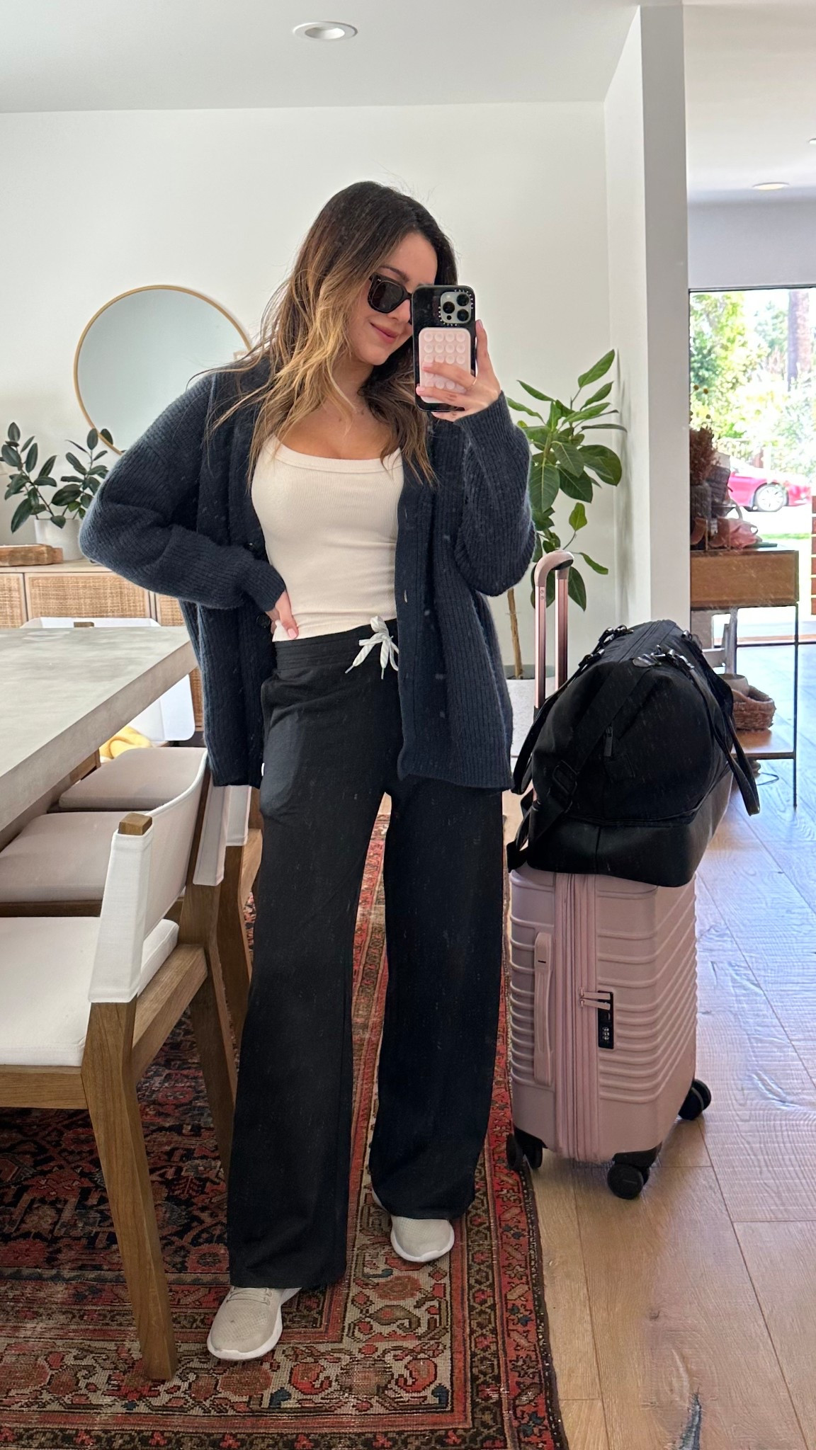 I’ve finally found the comfiest travel outfit EVER ✈️🧈 In love with these pants that are buttery soft - I’m 5’4” and got the short version but am linking regular also! The cardigan is an investment piece that I purchased during a Shopbop sale and I wear it all the time. Linking some similar option also!  #travel 

#LTKSeasonal #LTKTravel