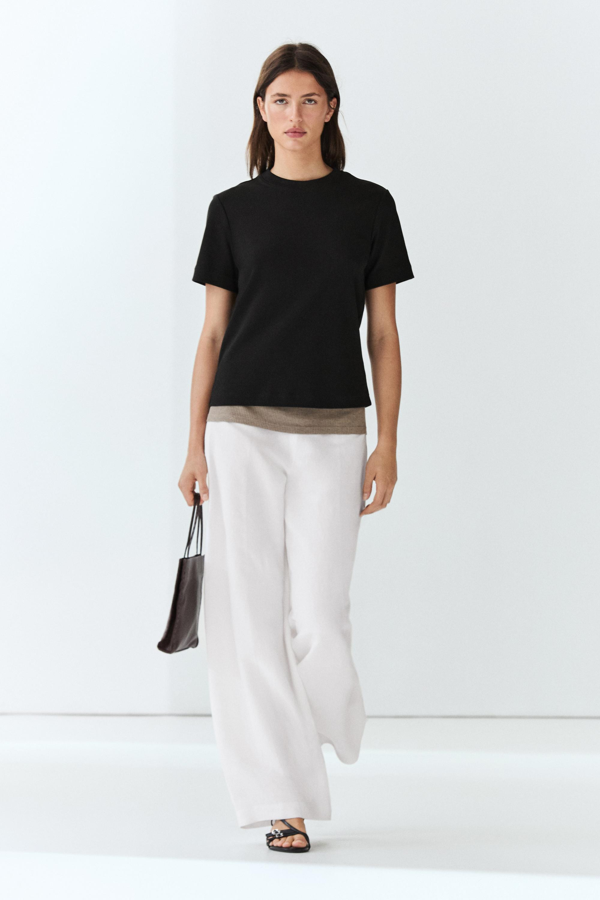 T-shirt made from 100% cotton fabric with a compact and flexible weave. Crew neck. Short sleeves.... | Massimo Dutti UK
