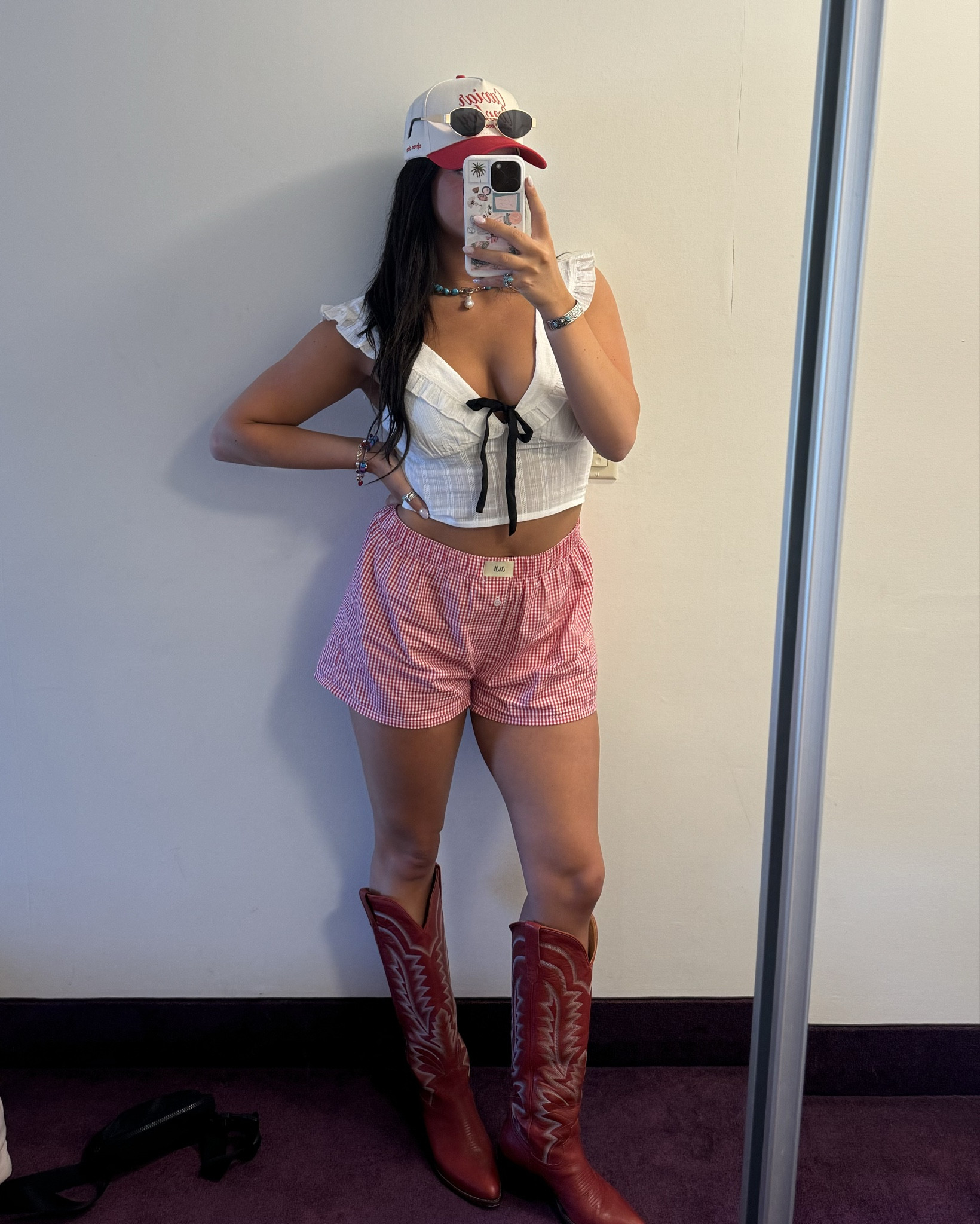 Country music festival outfit! Western inspired top paired with the very trendy Gen Z boxers :)) and of course cowgirl boots duh 

#LTKFestival #LTKU #LTKStyleTip
