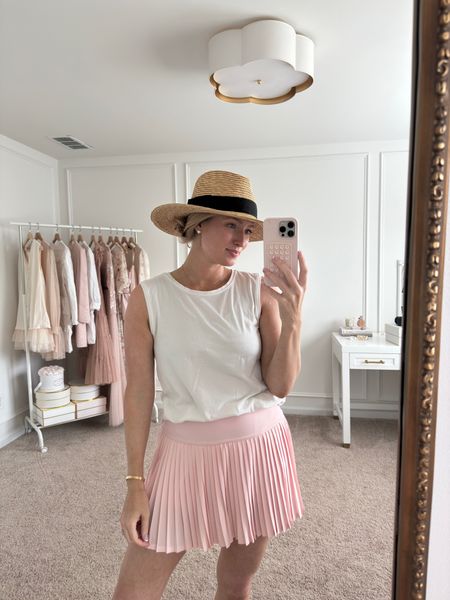 It was nearly 80 degrees this week when I went for a walk! I wore this affordable Amazon find - love the pleated tennis skirt! Wearing a medium with my favorite sun hat 

#LTKSeasonal #LTKfindsunder100