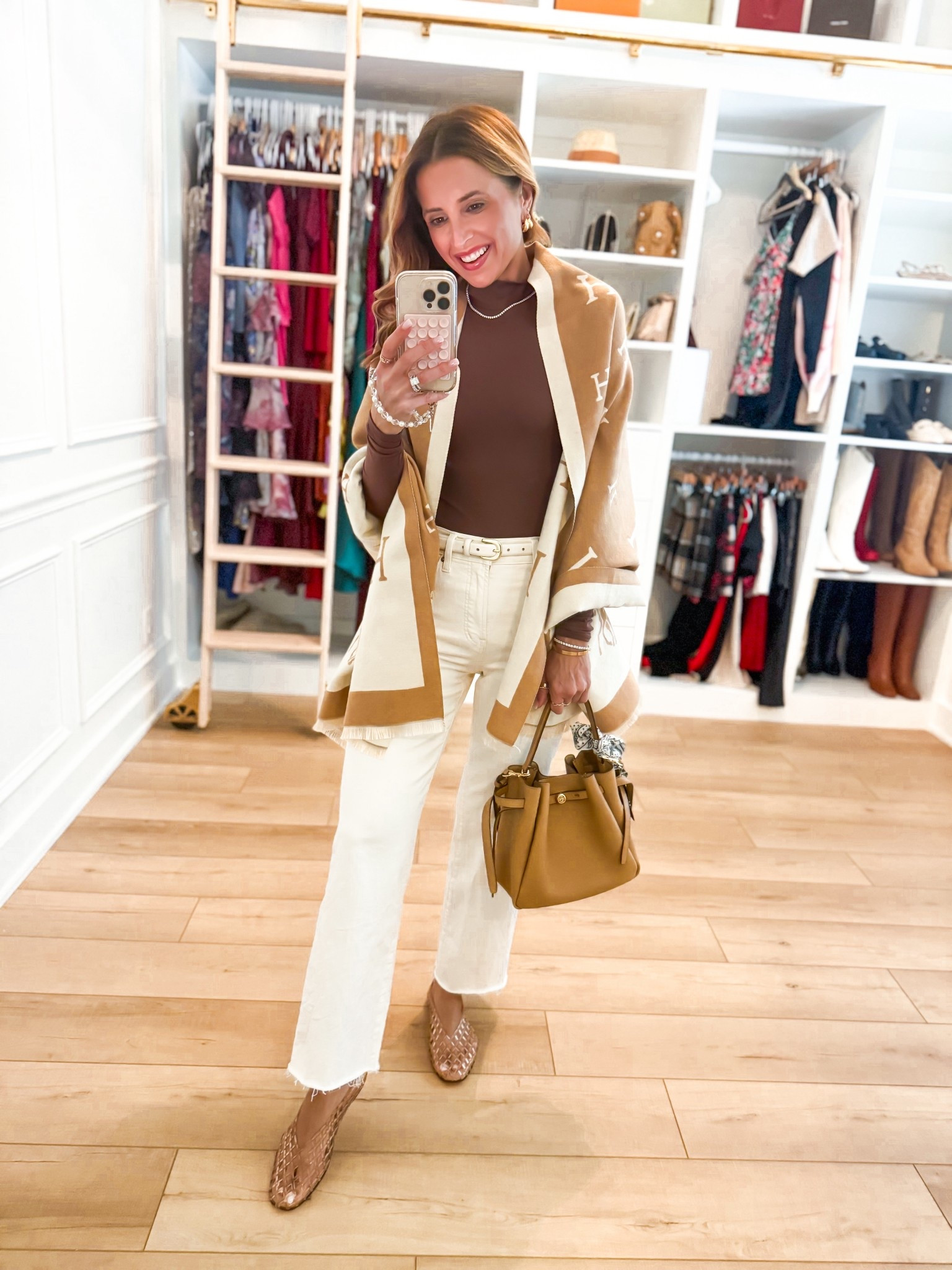 My spring outfit of the day! Elevated casual outfit. Mom outfit. Cream wide leg crop jeans in 24 regular - I did regular since it’s a crop style and I wanted full length. Amazon reversible pashmina shawl. Seamless mockneck top in XS. XS in belt. Dolce Vita flats are whole sizes only - I am a 6.5 and sized down per reviews and they fit perfectly! Tory Burch Romy Bucket bag. 

#LTKgrwm #LTKootd #LTKPetite