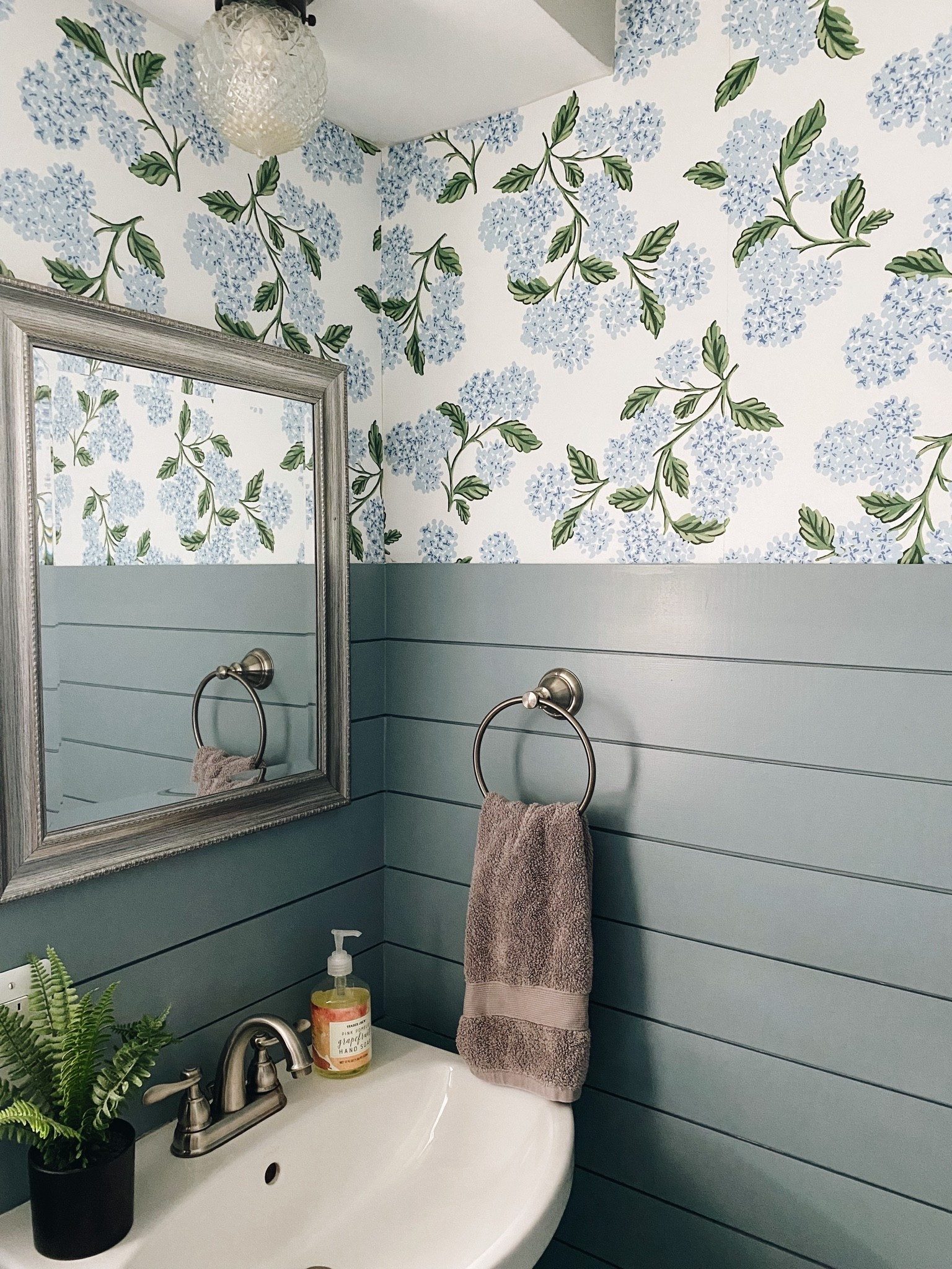 Sherwin Williams Debonair is my favorite medium-blue color we picked for our powder bathroom makeover. I’m so sad that we did this makeover just before moving, and I’m still swooning over the final result! See the whole process here: https://dailysplendor.com/debonair-sherwin-williams/

#sherwinwilliams #debonair #bluepaint #powderroom #bathroommakeover #DIY #homerefresh #wallcolor #paintcolor #interiorpaint #bathroompaint #homedesign #homestyling
