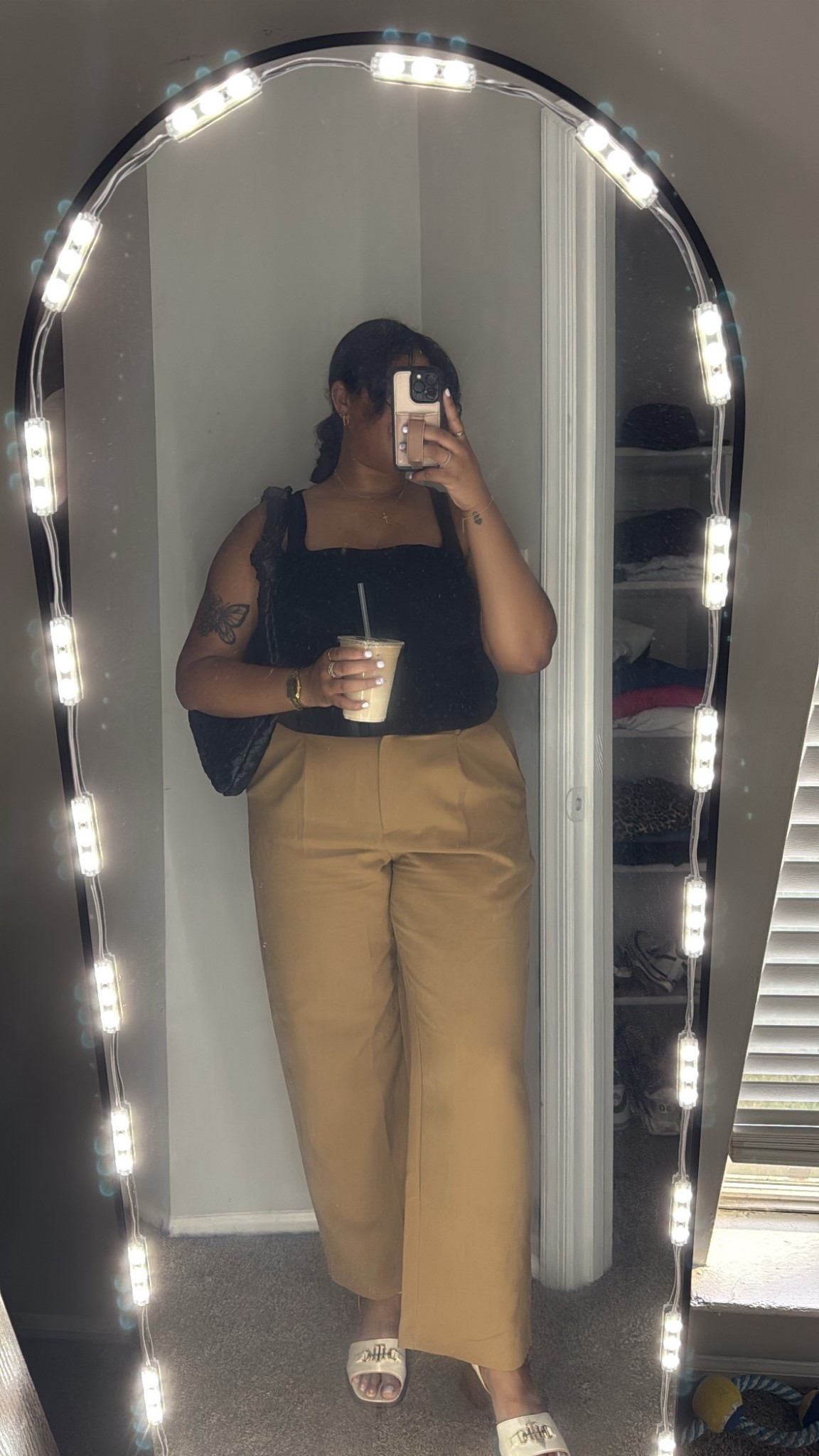 Thursday’s neutral vibes 🖤🤎 Kept it classic with a black textured tank and wide-leg camel trousers — easy, elevated, and perfect for work or weekend coffee runs. Finished the look with my Tommy Hilfiger slides (so comfy and cute, IYKYK 👀) + my go-to slouchy shoulder bag. #LTKWorkwear #TommyHilfigerStyle #NeutralOutfitInspo #LTKUnder100 #LTKCurves #CoffeeOotd #EffortlessStyle

#LTKShoeCrush #LTKWorkwear #LTKStyleTip
