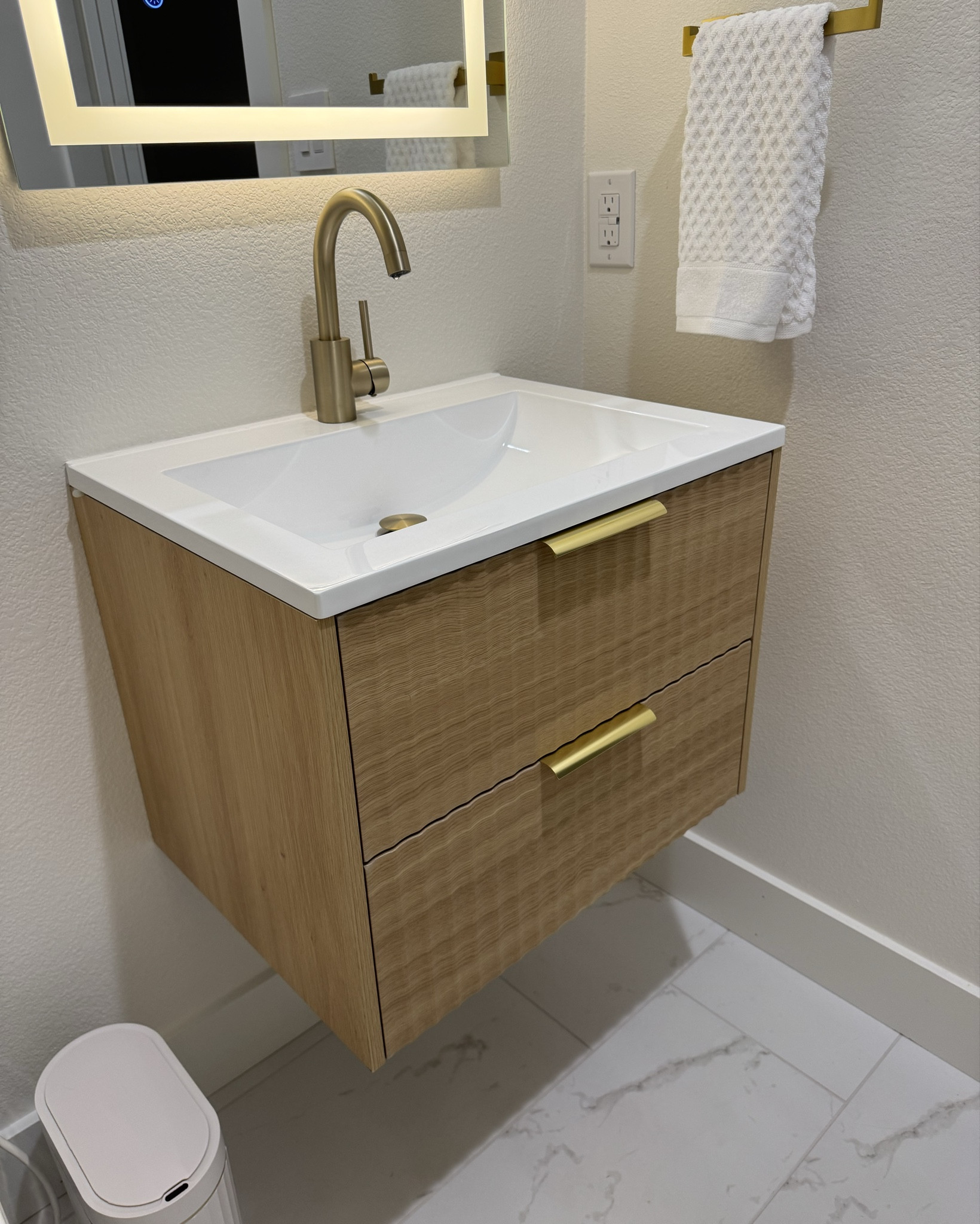 I put this floating bathroom vanity in my guest bathroom! The fluted element is so pretty! #vanity #bathroomvanity #cabinets #bathroomcabinet

#LTKHome