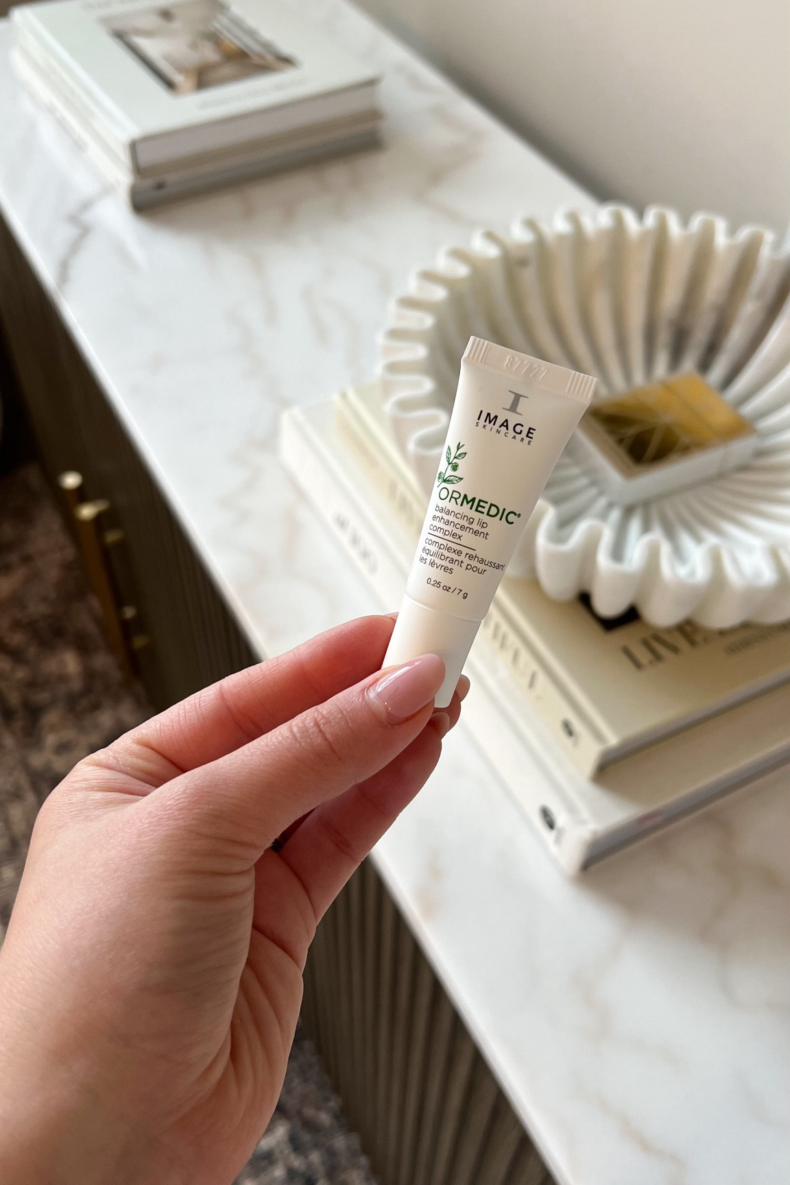 This is my new favorite lip balm! It gives my lips a natural fullness, and it smells amazing—like a refreshing citrus scent! I can’t leave the house without it! 

#LTKbeauty #LTKfindsunder100 #LTKfindsunder50
