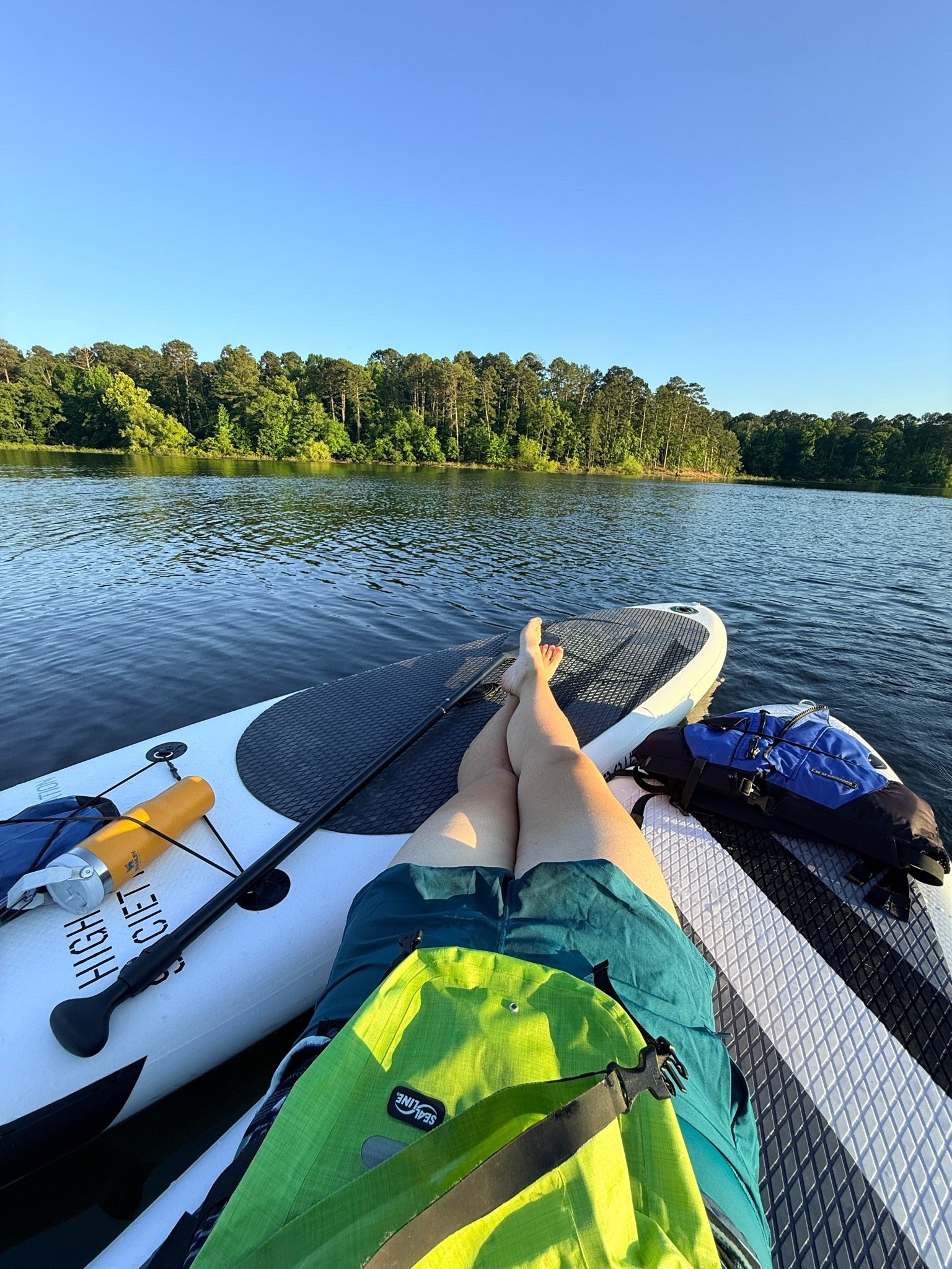 Why inflatable paddleboard are the best: this was my view exactly one hour after deciding to go. Easy to grab and go. Plus - by always having my “adventure” gear in one spot we get to get out more. Both my daughter and I love Title Nine her and we both wear their based shorts and rash guards. Bring on summer.

#LTKSwim #LTKOver40