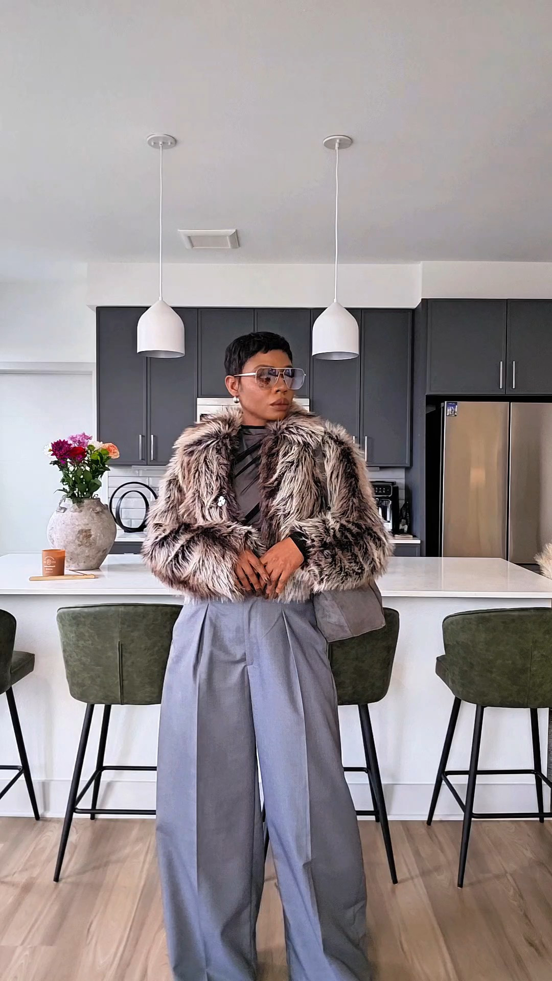 How to Style Cropped Faux Fur | Street Style Winter Outfit Inspo Cropped faux fur but make it street style.  This cropped faux fur from Urban Revivo was gifted, and I had to show how I’d actually style it. I love taking a soft, luxe texture like faux fur and balancing it with structured oversized trousers and sharp heels for that elevated street look. This monochrome grey moment feels chic, effortless, and perfect for winter into early spring.Sizing:Pants 4Coat XSFaux fur, winter, faux fur coatSave 15% with code SHARITA

#LTKootd #LTKgrwm #LTKPetite