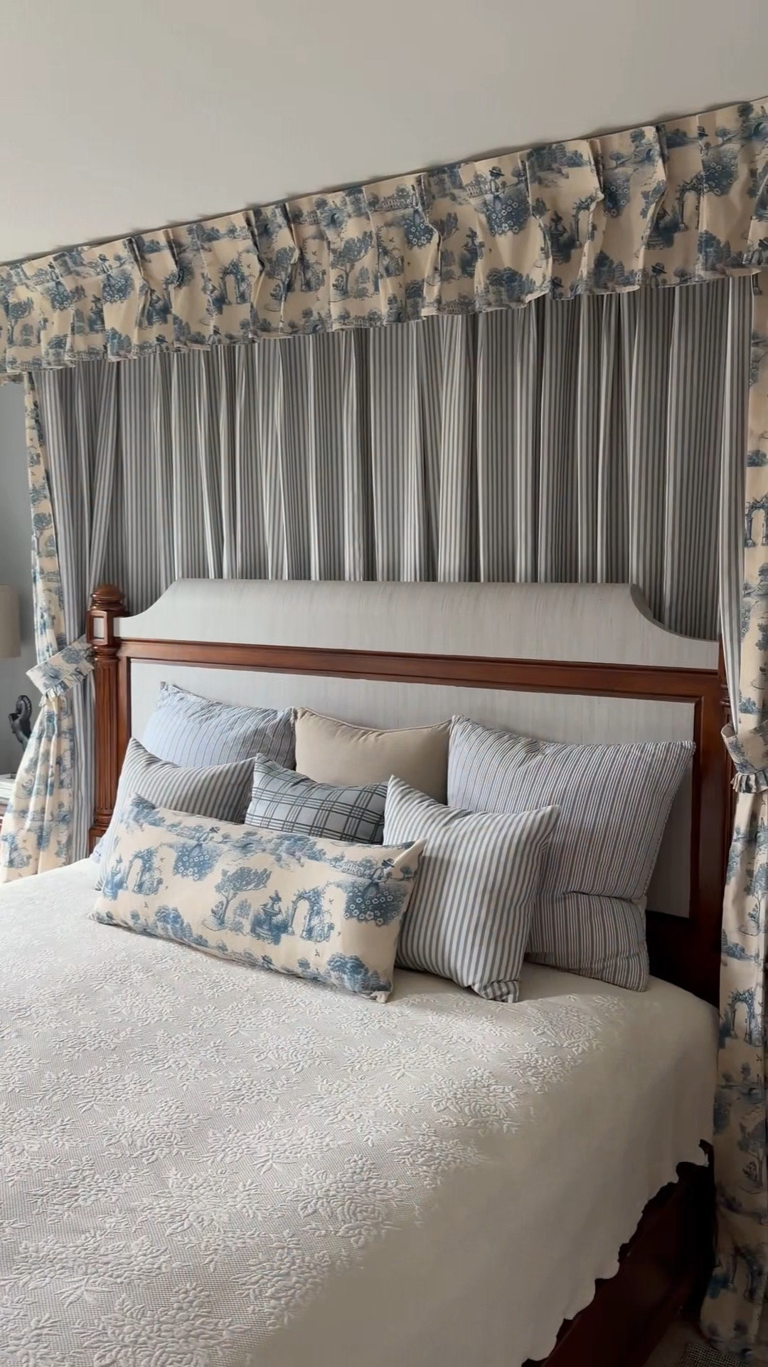 A little French-inspired dreaming in the bedroom. ✨🇫🇷

Who knew a cozy bed canopy could be created entirely with pieces designed for your windows? Using @twopagescurtains  ceiling tracks, curtains, a custom valance, tiebacks, and matching pillows, our bedroom feels like it’s in a charming French country chateau! Use code EBH to apply discount!

#LTKHome #LTKSaleAlert #LTKmomlife