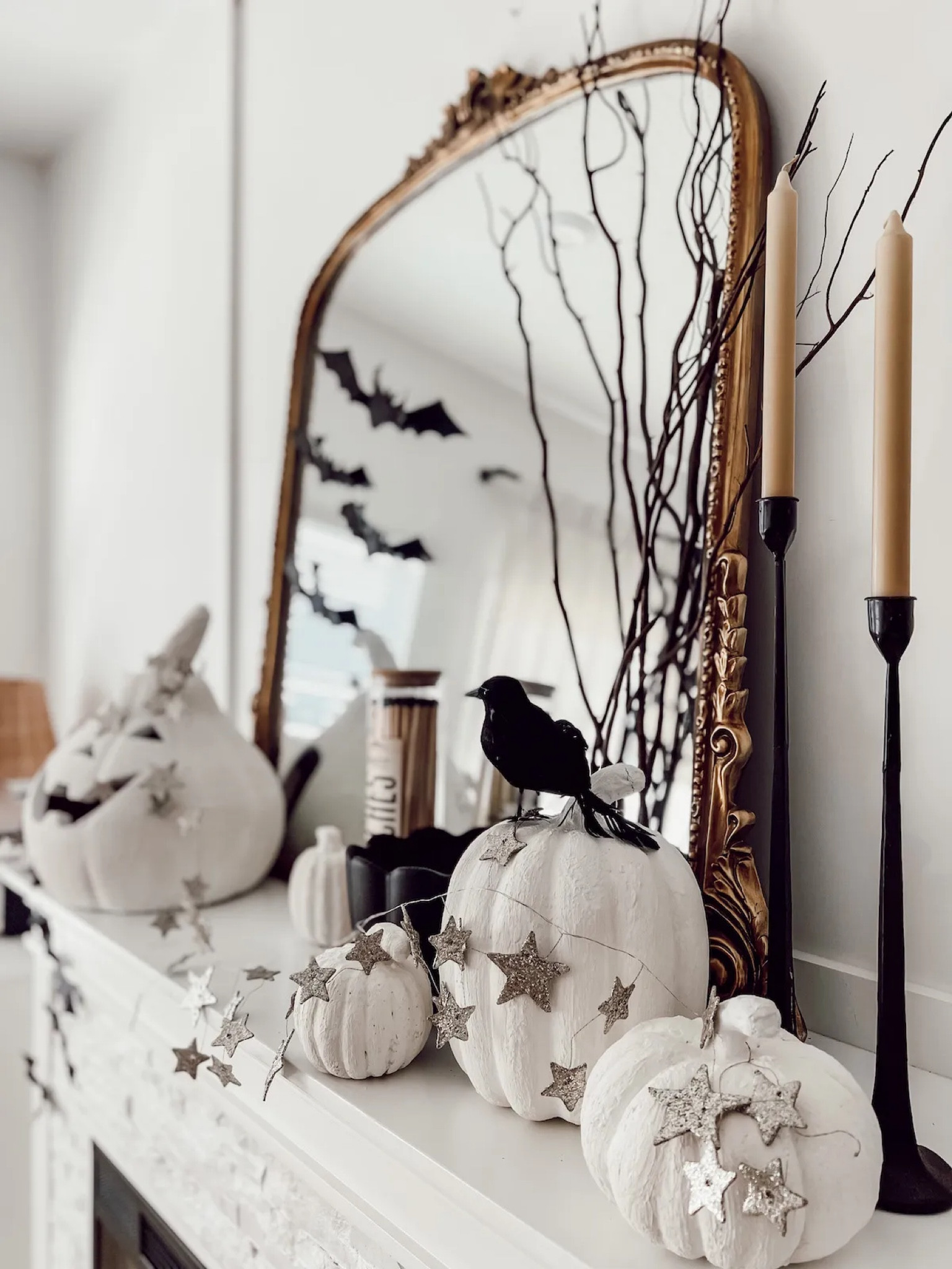 Halloween mantle #candles #halloweendecor #crows #bats #anthropologie #mirror 

#LTKSeasonal #LTKhome #LTKHoliday