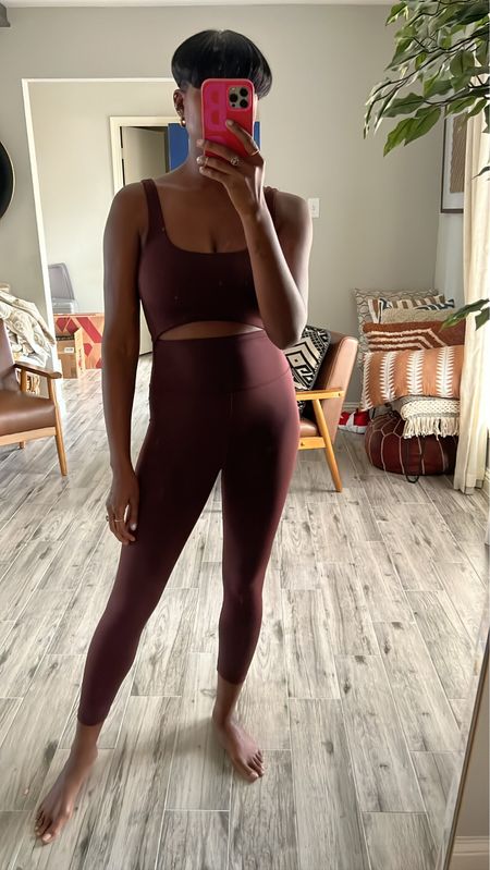 Cut out one piece unitard from madewell. Comes in brown and the soft blue. My regular size is a small but I’m wearing a medium for more comfort. 

#LTKfit #LTKFind #LTKtravel