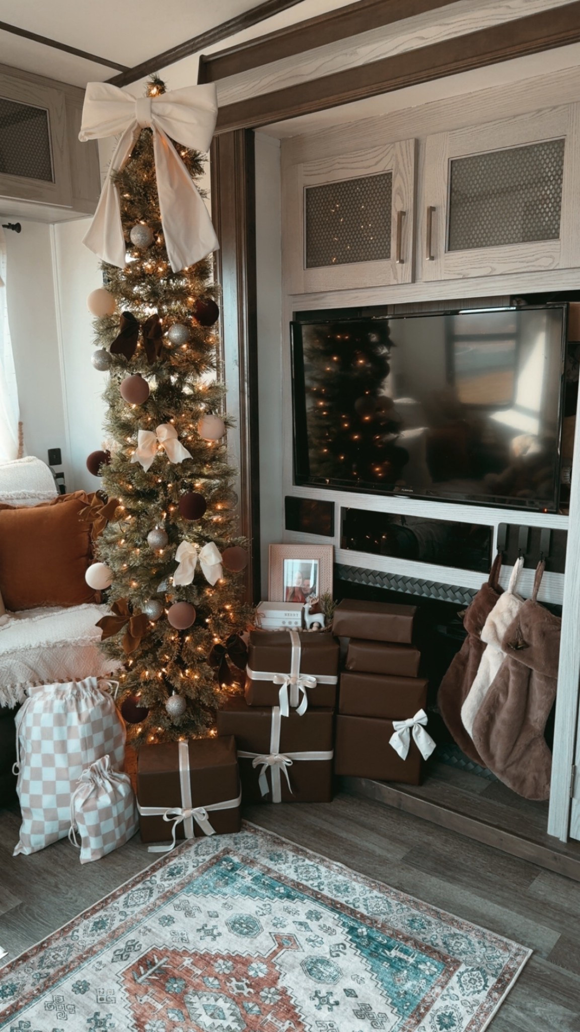 Christmas in a camper, but make it neutral + cozy 🤍🎄Tiny space, big holiday magic ✨ I love how soft textures, warm neutrals, and boho details make our little home feel extra special this season. Proof you don’t need a lot of space to make it feel festive 🕯️🤍 christmas in a camper | camper christmas decor | rv christmas decor | tiny living christmas | tiny home christmas | neutral christmas decor | boho christmas decor | boho holiday home | cozy christmas aesthetic | camper living | full time rv living | fifth wheel decor | small space christmas ideas | minimalist christmas decor | warm neutral home decor | camper home decor | holiday decor inspiration | cozy tiny home

#LTKHome #LTKSaleAlert #LTKHoliday