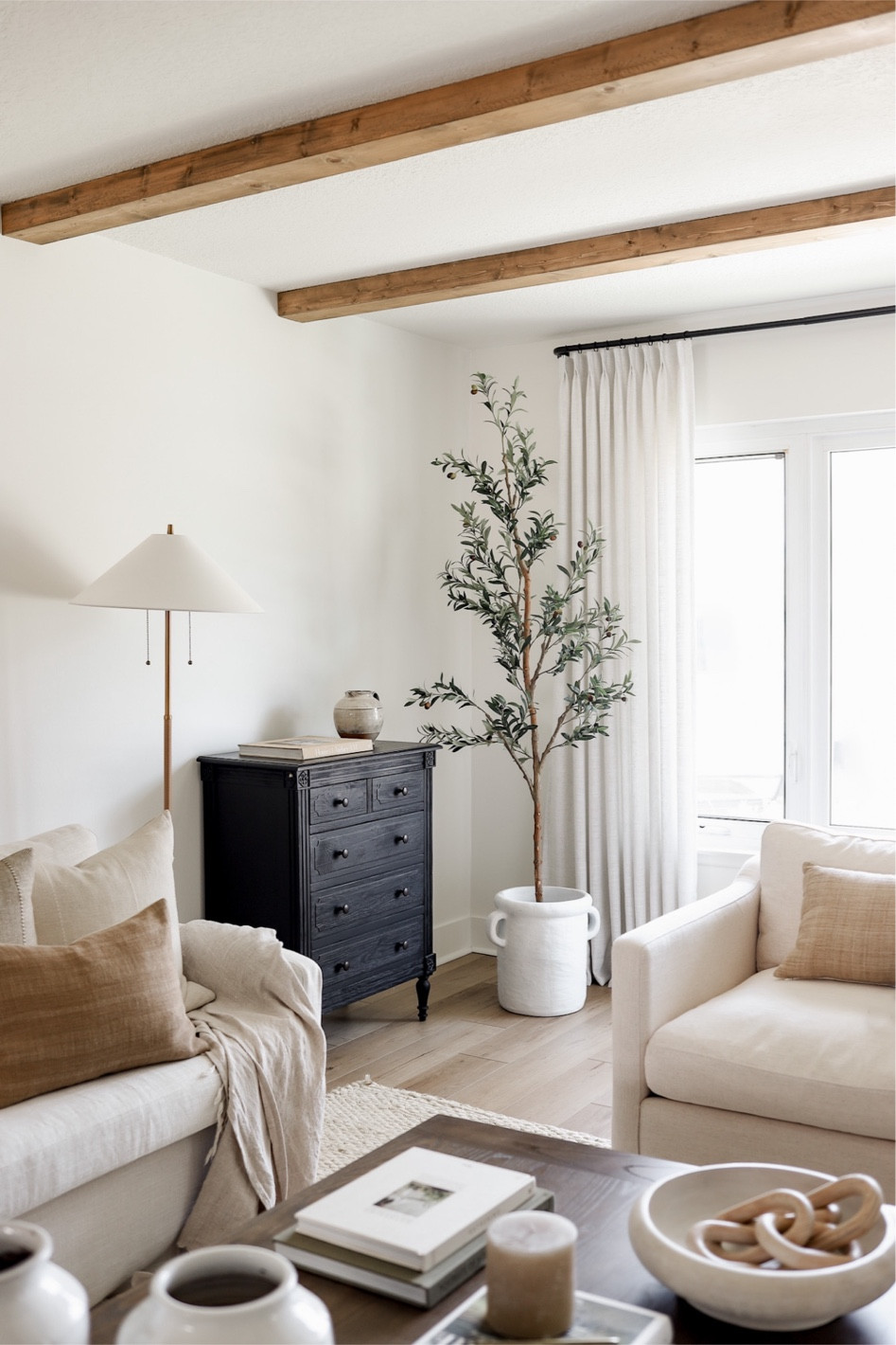 Shop our neutral living room furniture and decor, including this faux olive tree that’s on sale at Amazon.com now! 

#LTKSeasonal #LTKhome #LTKunder100