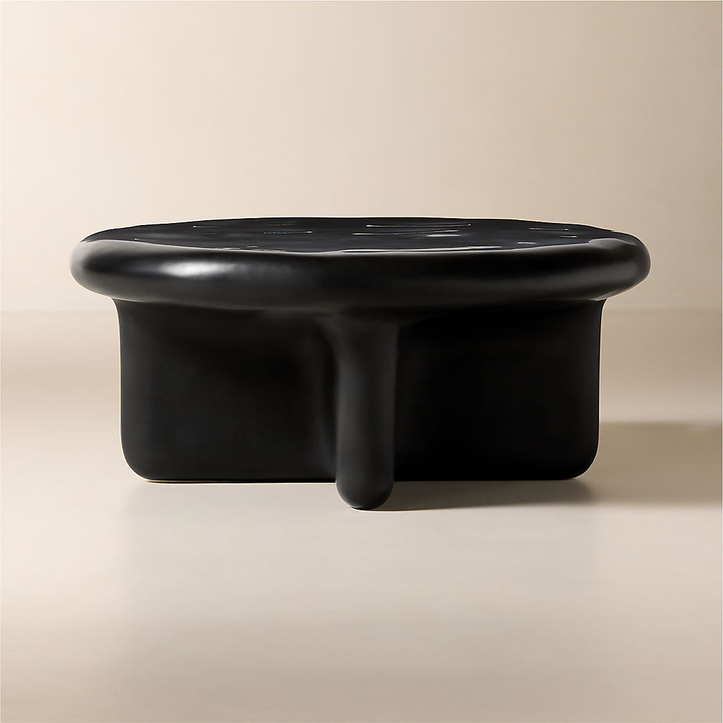 Bodene 36" Round Black Resin Coffee Table + Reviews | CB2 | CB2