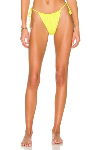 VDM Reversible Marley Bikini Bottom in Lemon Granita Rib & Matte Lemon from Revolve.com | Revolve Clothing (Global)
