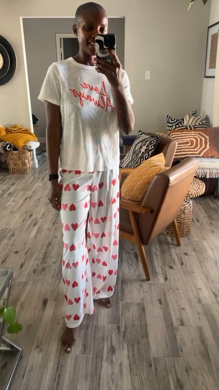Valentine’s time cozy pj outfit! White Pajama pants with red hearts and white graphic tee  

#LTKSeasonal #LTKfindsunder50 #LTKVideo