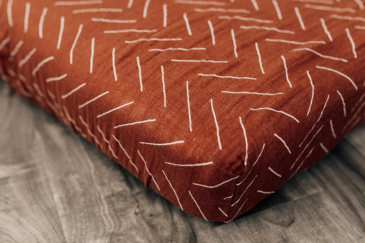Muslin Crib Sheet, Rust Mudcloth | SpearmintLOVE