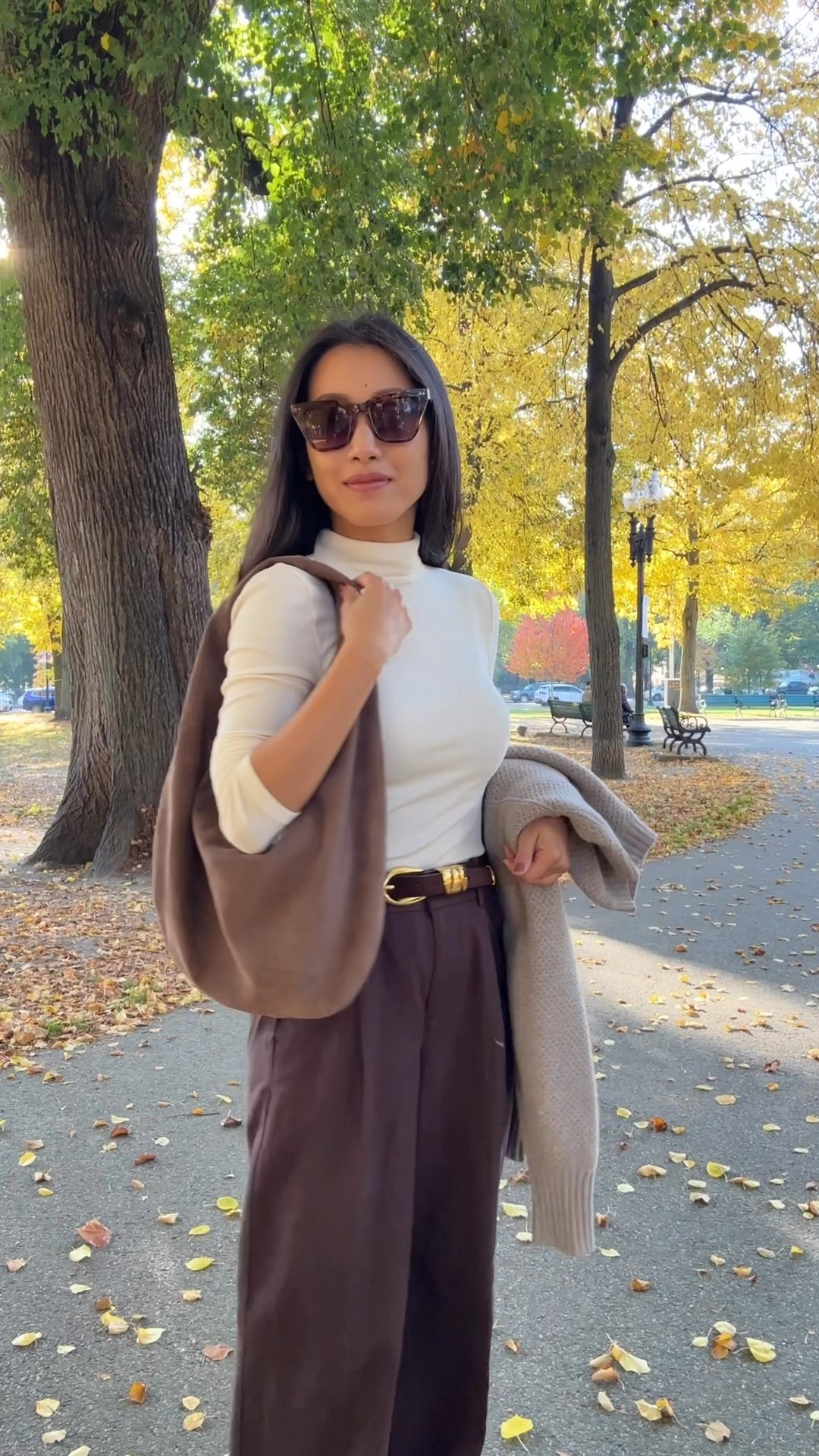 Madewell sale alert! 

Includes the chocolate raisin bucket tote (linked) that I’ve featured a lot lately 

Also I got you guys an Etsy coupon code for my hobo bag! JEANHOBOBAGS25 for 25% off the retail price 

• Madewell slouchy straight pants 00P - these run big at the waist so I have them belted. Size 00P measures 13.75” across waist, 10.5” rise, 27” inseam. I would usually need a low heel with 27” long pants, but when I belt these, I can wear them with flats or sneakers without hems dragging   

• Madewell ribbed cream top xxs - linked this year’s version 

• Everlane honeycomb sweater xxs 
Old but they brought it back in turtleneck form

• Etsy suede hobo bag in Corteccia color, medium size . Would also make a great gift! Looks like  designer version that is 2000$. 

This is a Beautiful bag that is made to order. Tons of color choices, responsive and helpful seller when you ask about color options, and it only took about 2 weeks to arrive from overseas. Perfect slouch, very comfy over the shoulder and actually stays on.

• BP sunglasses- my go to sunnies! $15, I have them in multiple colors. 

• Adidas spezial sneakers 5, runs tts to a little big , size down if between sizes 

• Madewell triple metal keeper belt xxs 

Smart casual fall outfit, workwear trousers, easy mom style, autumn travel outfit 

#LTKSaleAlert #LTKItBag #LTKWorkwear