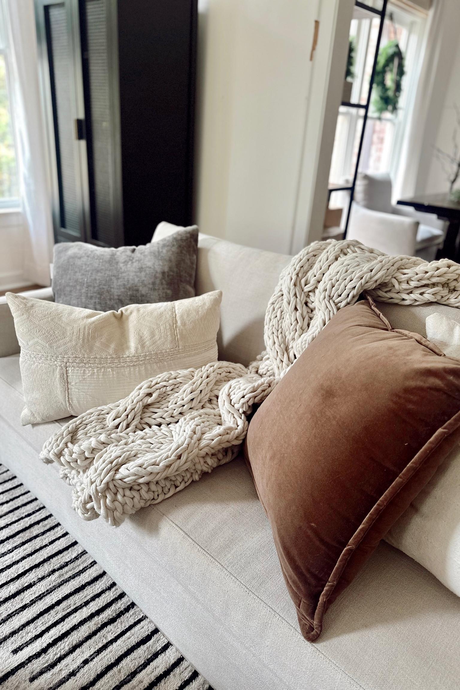 Living room throw pillows // neutral holiday pillows // chunky knit blanket // Pottery Barn // kohls 

#LTKSeasonal #LTKHoliday #LTKHome