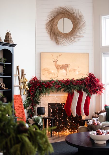 Now that I’ve officially done our mantle *twice* I can easily list out everything to recreate this on your mantle! I swear this thing falls down every single year. Every year! 🤦🏼‍♀️ Anyway, links to the exact numbers of greenery, red berries, and red florals are on the blog! firsthouseonfinn.com/blog

#LTKhome #LTKSeasonal #LTKHoliday
