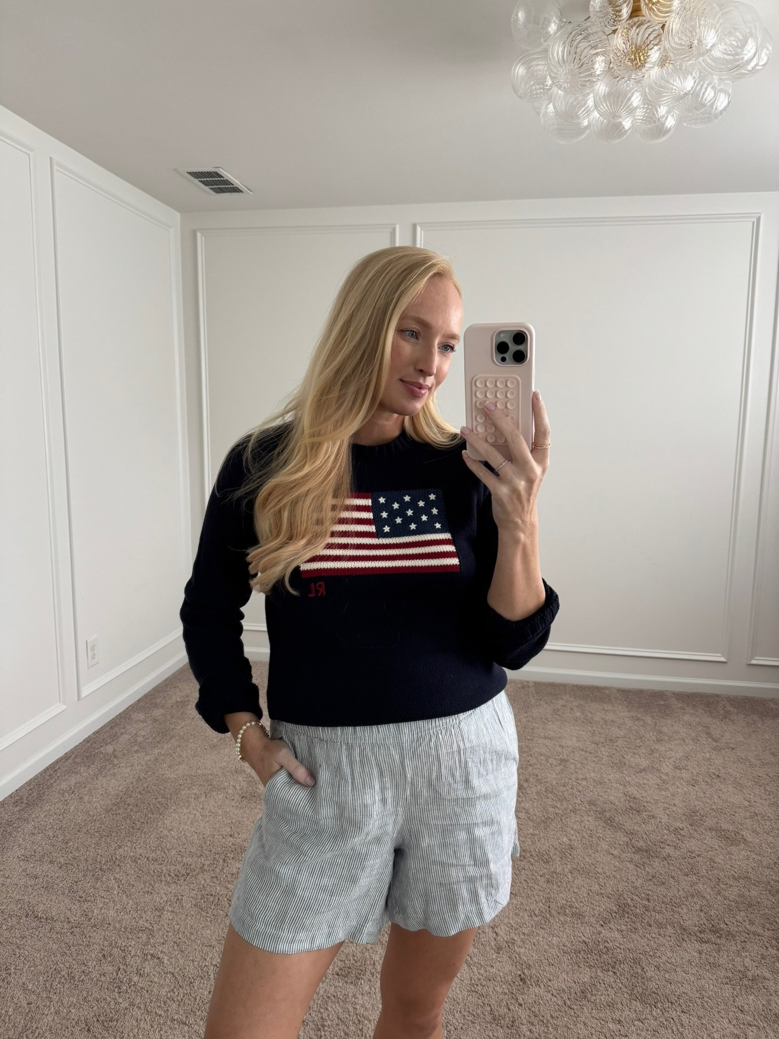 Casual, bump friendly, 4th of July look! Summer outfits // summer sweaters // patriotic sweaters // summer shorts // linen shorts // 4th of July outfits // casual outfits // white sneakers // bump friendly 

#LTKStyleTip #LTKSeasonal #LTKBump