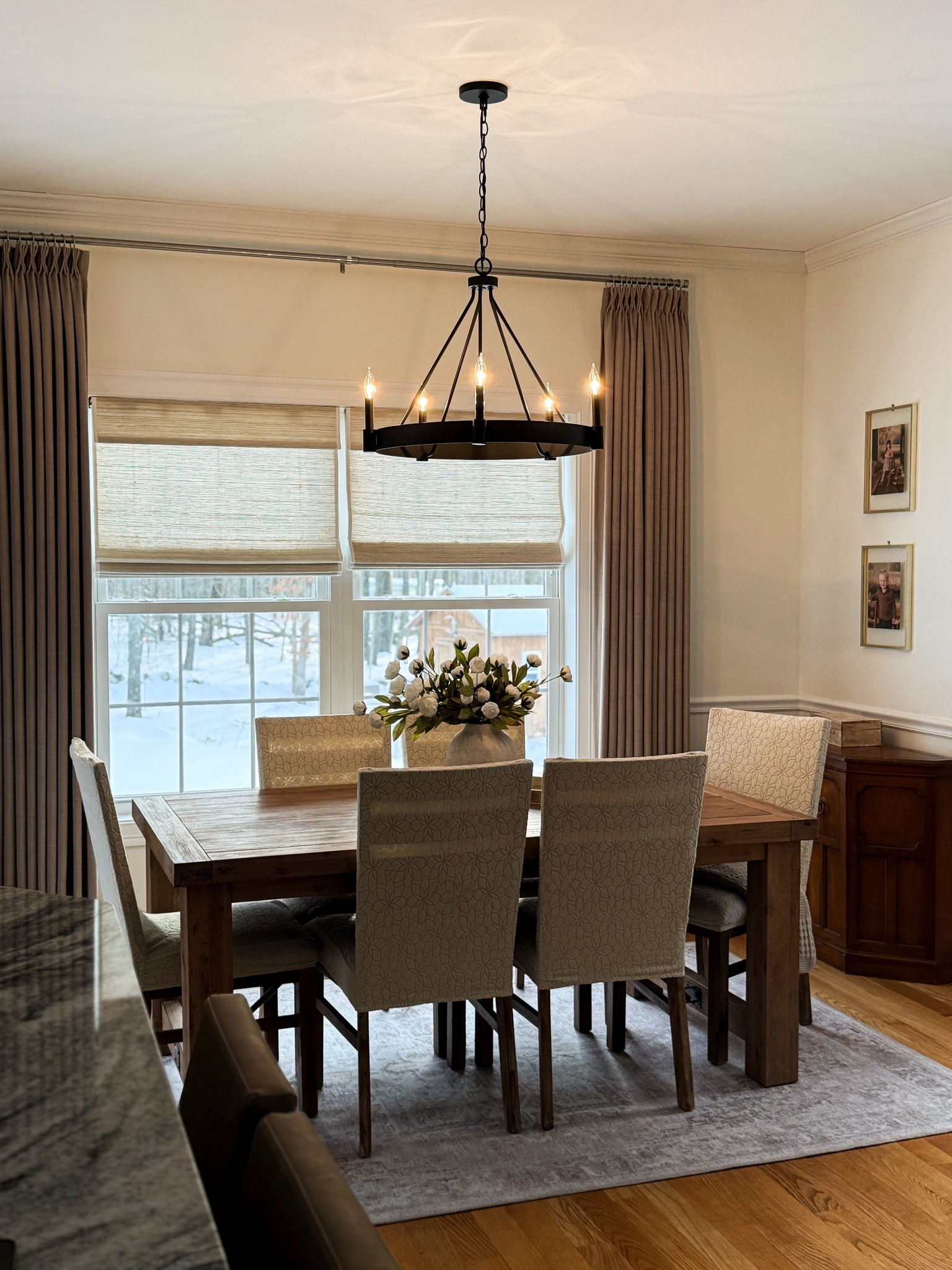 In the midst of a blizzard but so thankful to have this BEAUTIFUL light from @urbanambiancesocial to brighten up our mood. ☀️

This is the urban farmhouse chandelier in matte black. She is an absolute stunner. 

#LTKSaleAlert #LTKHome