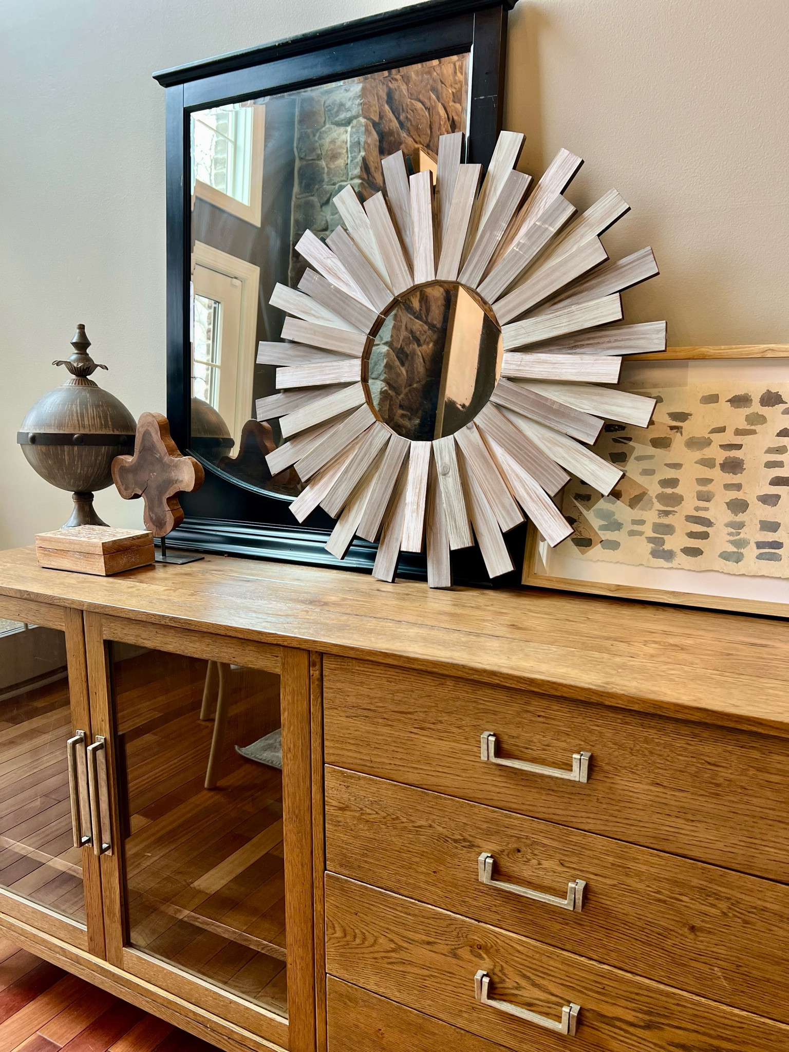 Get the look! The key to pulling off a layered, “collected” vibe is to mix size and textures of the items you’re placing. Try to resist giving each piece its own spotlight and think about the overall silhouette of the space you want to fill and how you can make a cluster of items give that desired silhouette a bit of dimension. In this house, we had a huge blank wall and we anchored it with this extra large, RH French Contemporary Sideboard. We then needed height and dimension on the wall. Sticking with black, natural wood and blue accessories, we created some height with the large black mirror and a silhouette that trickles out to the right, leading the eye down the length of the big 100” furniture piece. Need help with your space? We’re always happy to help and we even do virtual consults. 🙌🏼

At Home, Target, Wayfair, Anthropologie Home, West Elm, Amazon, home decor, styling tips, Restoration Hardware, side board, wall art, walk mirror, blue art, living room decor, dining room decor, transitional home decor, modern decor, high low home decorr

#LTKhome #LTKfamily #LTKstyletip