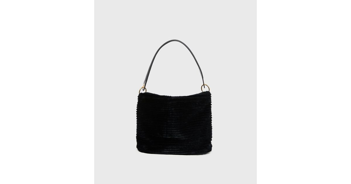 Black Ribbed Faux Fur Shoulder Bag
						
						Add to Saved Items
						Remove from Saved Items | New Look (UK)