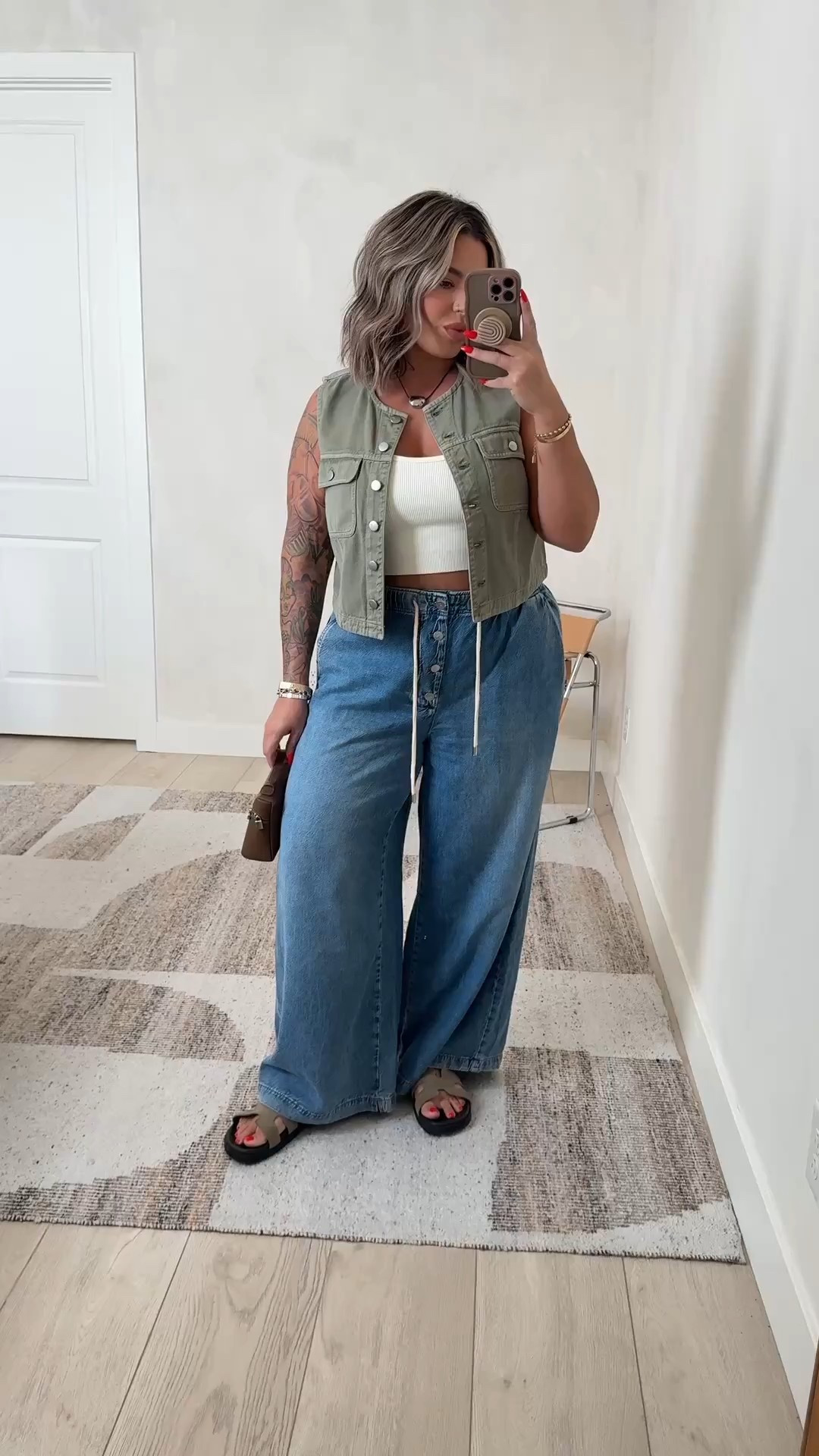 Tank XL 
Vest XL runs small def size up 
Jeans L run big if between sizes size down . 
Also linked a similar pair I have that’s more affordable to get the same look 
Sandals TTS 
#anthropologie #denim #madewell #amazon 

Follow my LTK @shaynaslife on the @shop.LTK app to view this post and get my exclusive app-only content!

#liketkit 
@shop.ltk
https://liketk.it/5kq0M

#LTKMidsize #LTKFindsUnder100 #LTKFindsUnder50