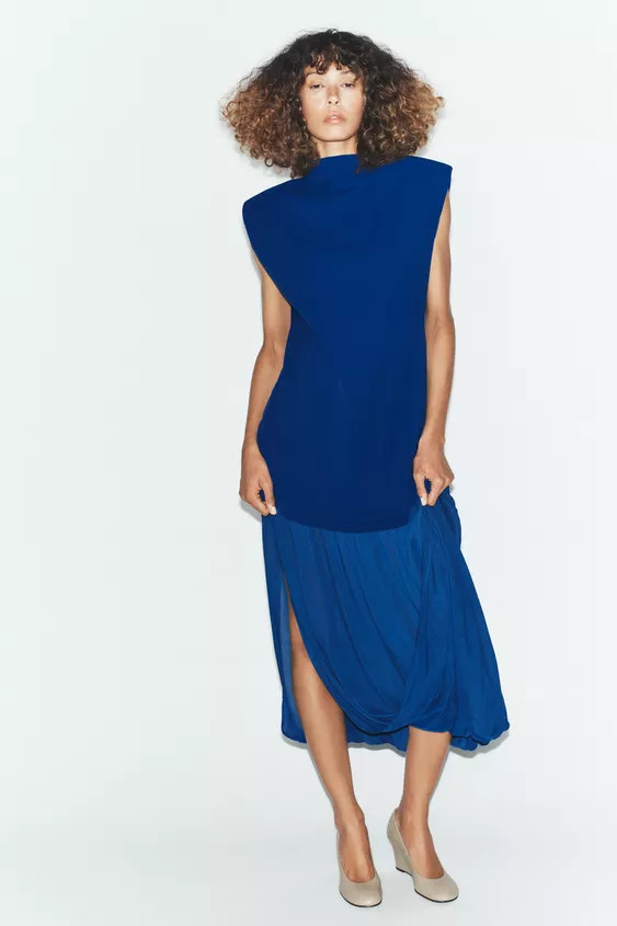 High neck sleeveless dress. Puffed hem with combination fabric. | Zara US