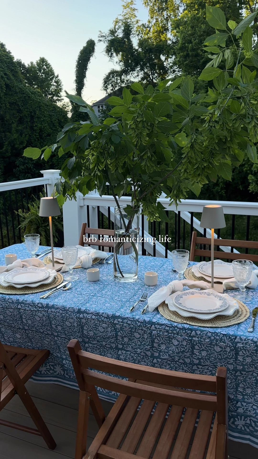 A dreamy Al fresco dinner on the deck to celebrate summer! Mini lamps and citronella candles for lighting, layered table setting, and statement arrangement on the table.  Block print table linen available at tableshoppeco.com. 

#LTKHome #LTKSeasonal #LTKParties