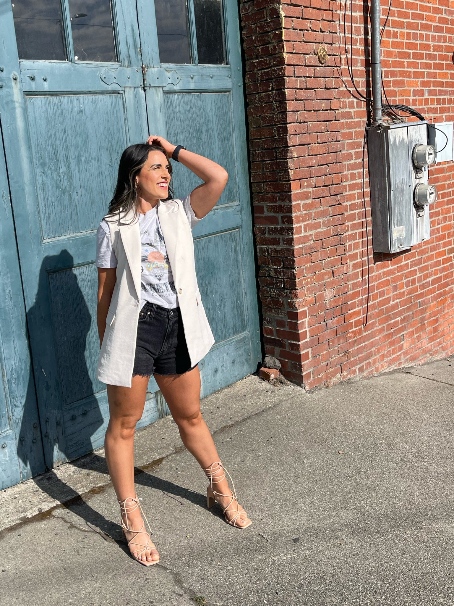 Black shorts outfit. Dressed up. Denim shorts for a night out. Graphic tee. Feminine style. Sleeveless blazer outfit. 

#LTKsalealert #LTKtravel #LTKstyletip