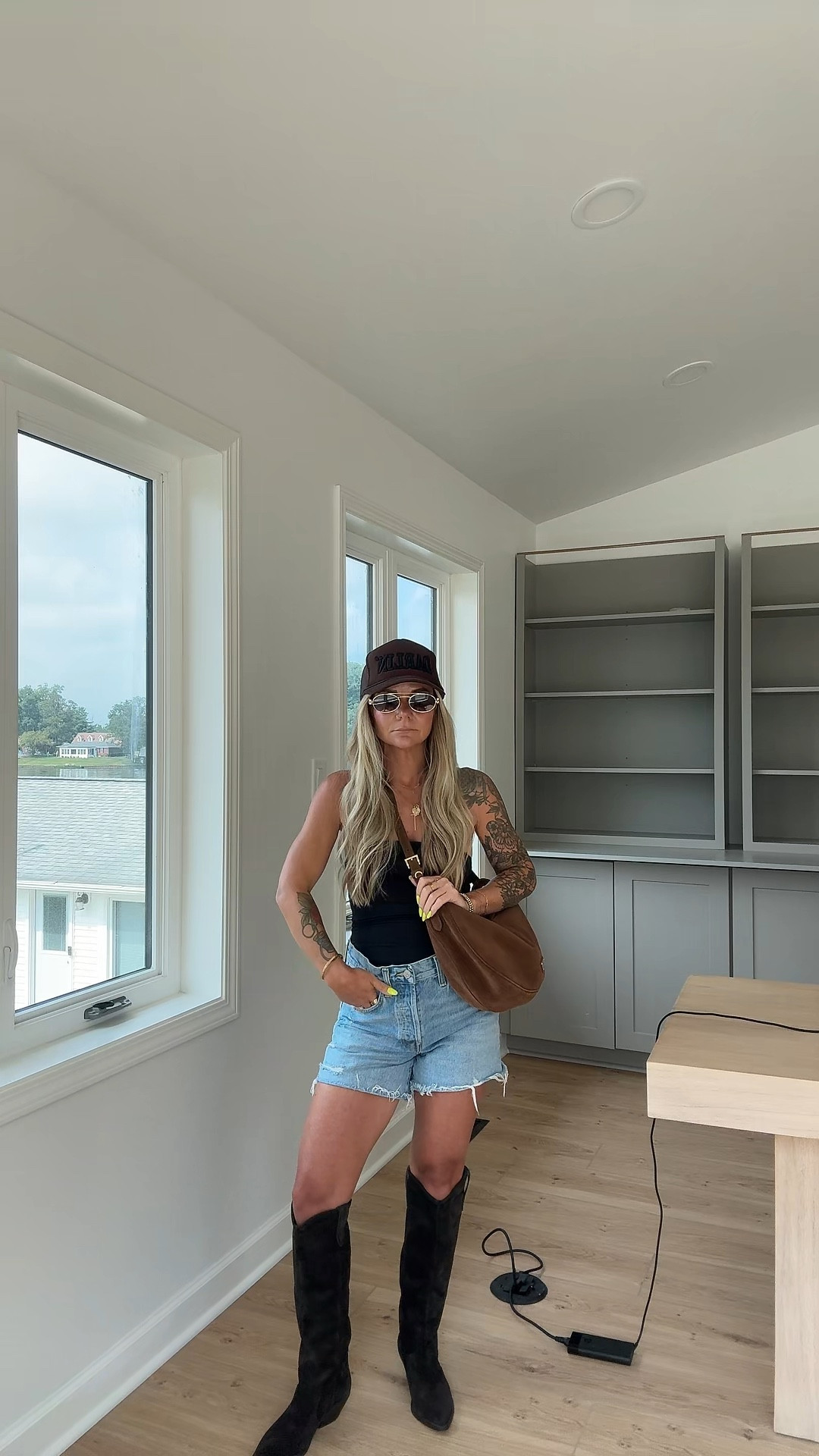 Summer temps with some fall transition 🤎

Wearing 24 in shorts & small in top
Boots run true to size
Sunnies are option pink
Bag is premium quality option 5


#LTKItBag #LTKShoeCrush #LTKSeasonal