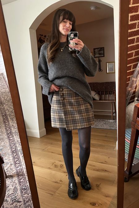 Oversized grey sweater from Everlane, plaid mini skirt from sezane, grey tights, black penny loafers, gold jewelry

‘15JESSICA’ for 15% off your Freda Salvador purchase  

#LTKsalealert