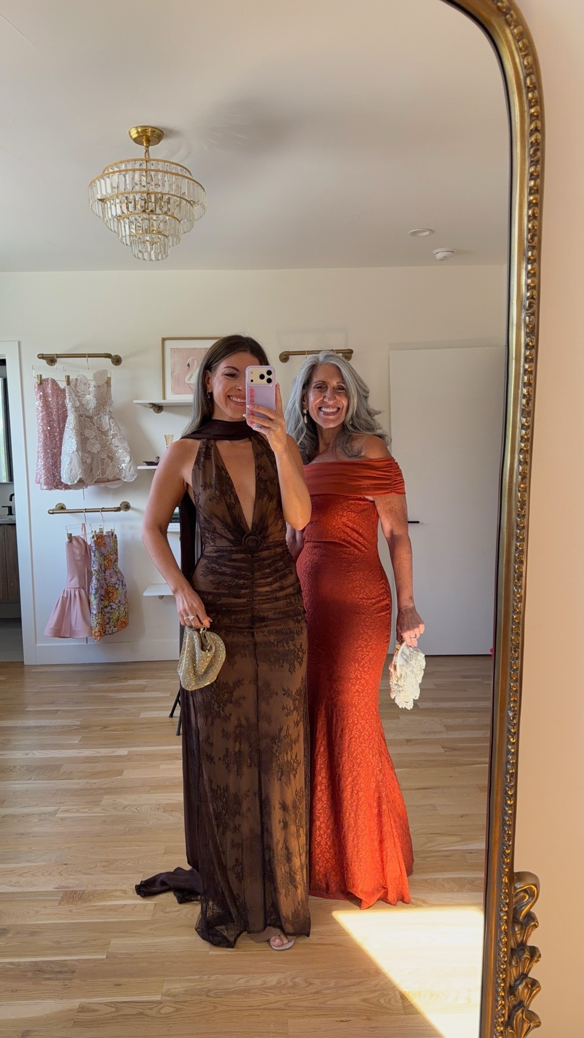 brown lace gown with a deep V neckline and a scarf that drapes down the back, rust orange satin gown with a small floral pattern and an off-the-shoulder neckline mom and me formal wedding guest and mother of the bride dresses 💍

I’m 5’4” and wear a size small/2 

mom is 5’4” and wears a medium/6

fall wedding guest dresses, wedding guest dresses, cocktail dresses, semi-formal dresses, black tie wedding guest dresses, destination wedding guest dresses, garden party dresses, wedding guest outfit ideas, mom & me outfits, mom & me dresses, matching outfits, mother daughter outfits, family photo outfits, wedding guest dresses, mother of the bride, mother of the groom, wedding guest outfit ideas

#LTKWedding #LTKU #LTKootd