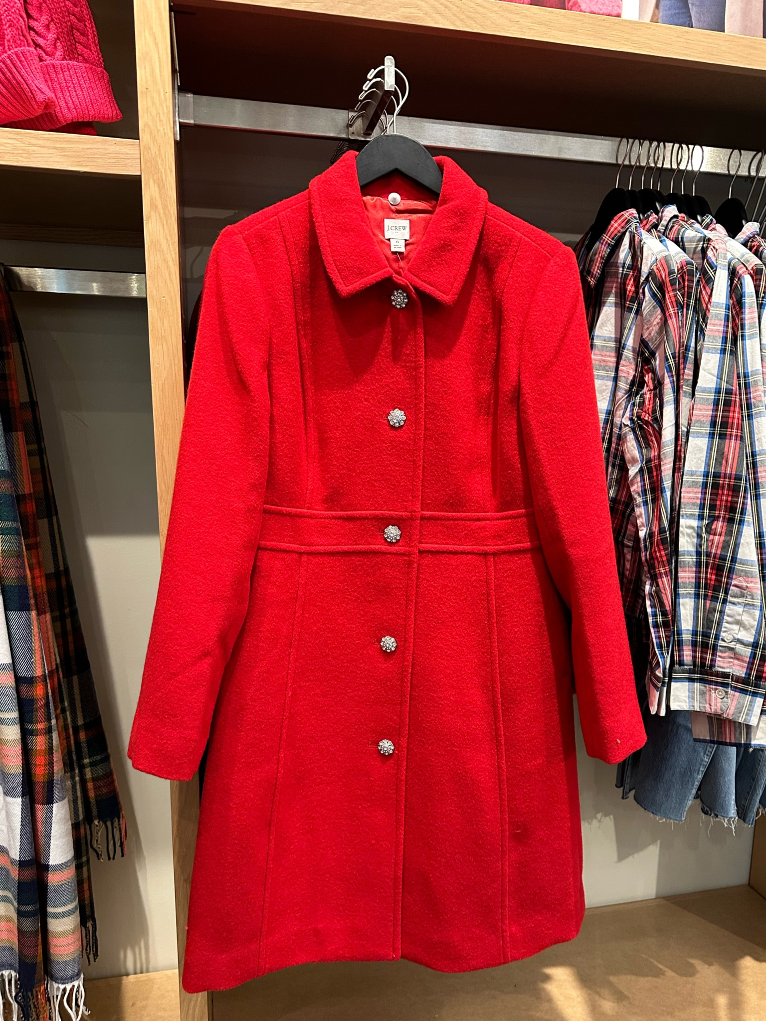 Gorgeous true red winter coat. Love the rhinestone button detail  