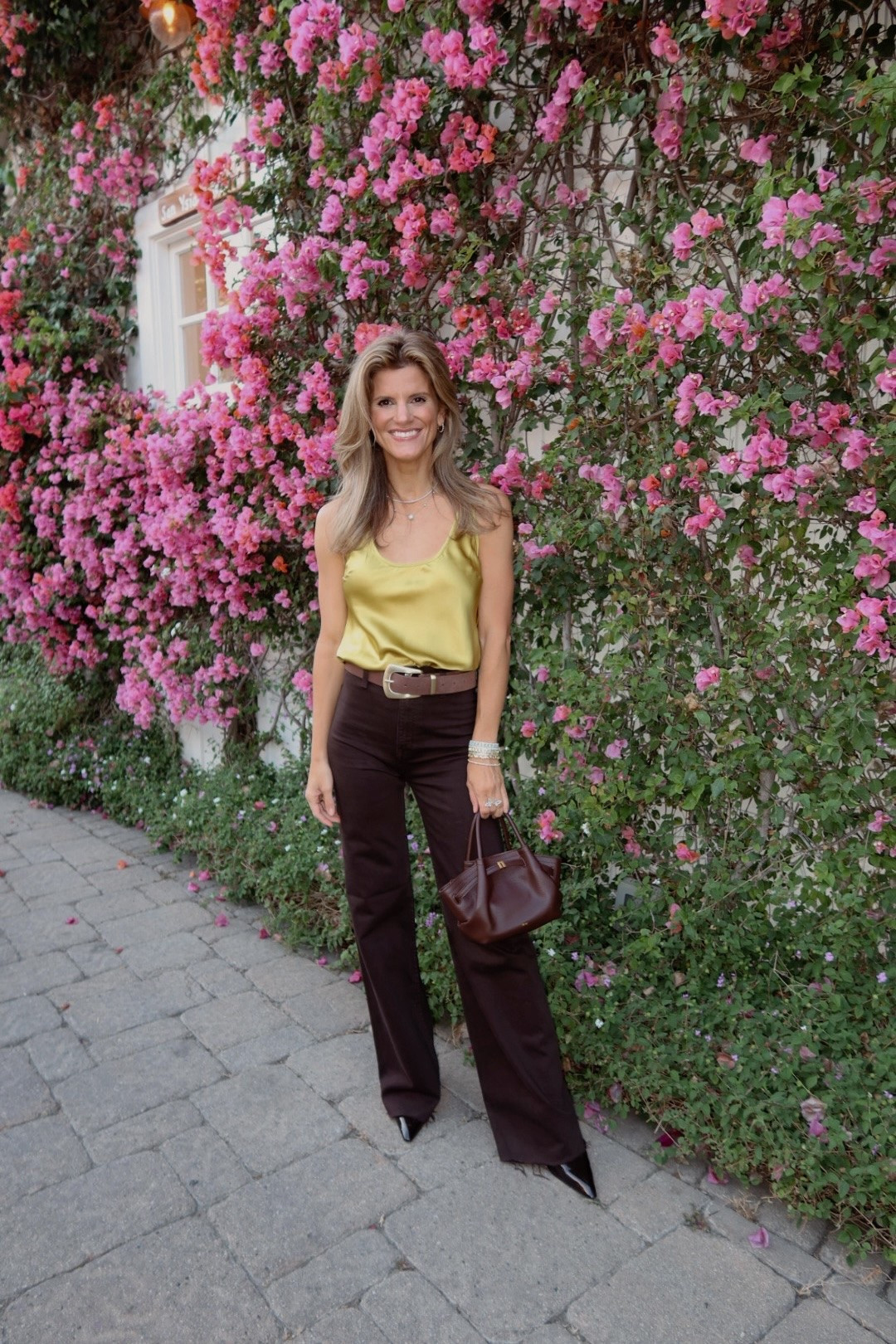 Chartreuse silk top and brown wide leg jeans