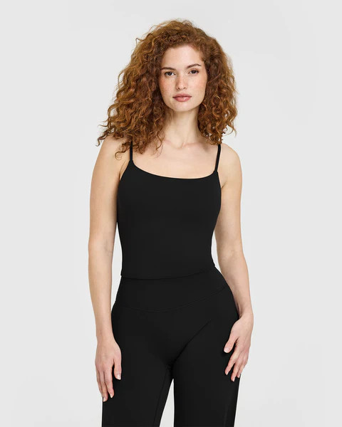 SoftMotion™ Strappy Mid Vest with Built in Bra Shelf 
 Black | Oner Active (UK / US)