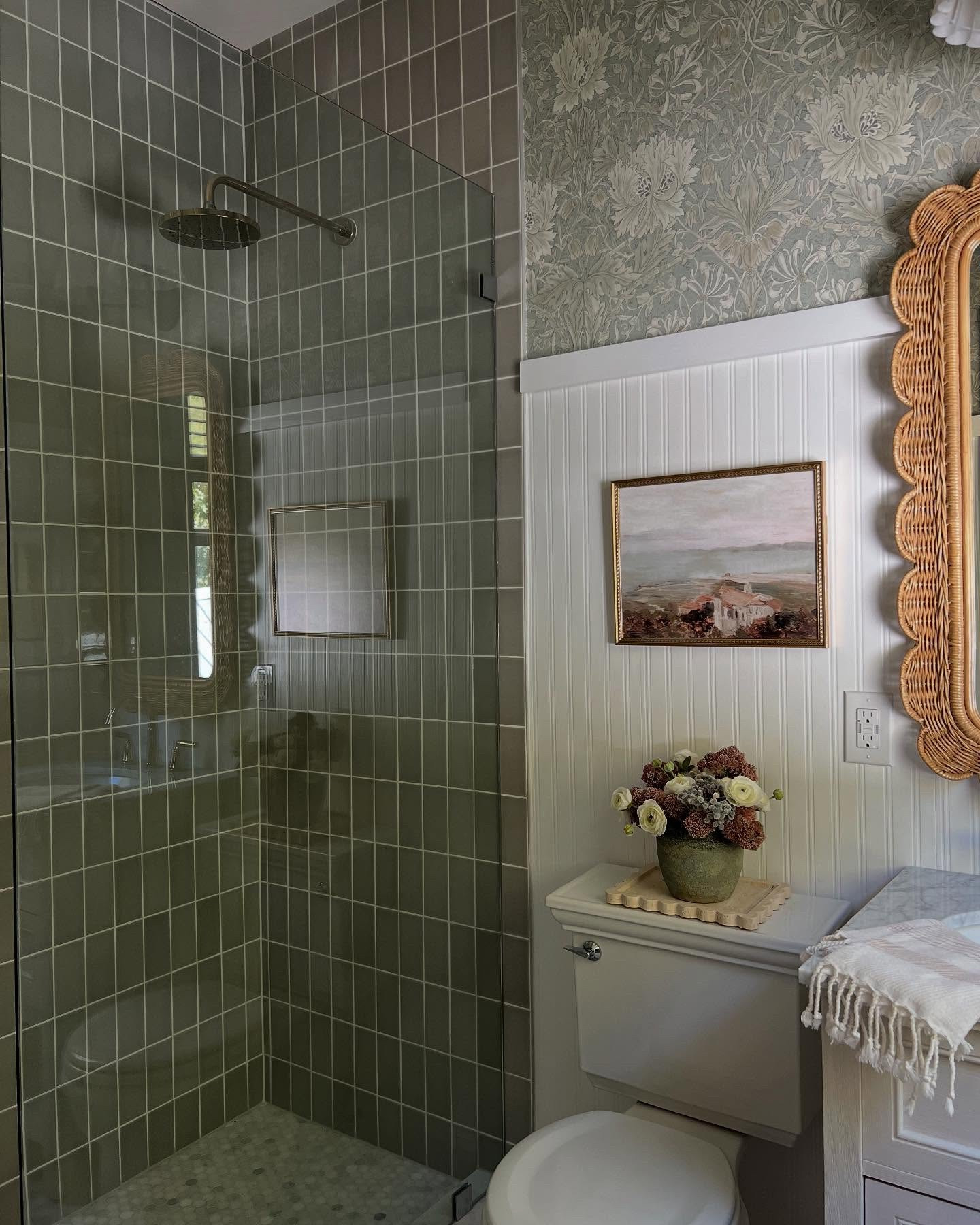 Small space, big impact👊🏻A dated, sterile feeling Jack & Jill bath turned cozy, character-filled en suite❣️Swipe to see the before👉🏻

•

•

•

#BathroomRenovation #BeforeAndAfter #HomeMakeover #BathroomGoals #ShowerUpgrade #EnSuiteTransformation #RenovationInspo #HomeDesign
#DreamBathroom #InteriorDesign
#HomeImprovement #RenovationJourney
#BathroomGlowUp #RenovationStyle
#DesignInspiration #HomeDecor #InteriorInspo #ModernEnglishCottage #CozyInteriors #TimelessDesign #BespokeInteriors #CharlestonInteriorDesigner #CharlestonInteriors #EDesign #VirtualInteriorDesign #OnlineInteriorDesign #EDesignServices #DesignFromAnywhere #SmallBathroom Bathroom Ideas, Bathroom Design, Wallpaper Bathroom, Bathroom Renovation, Green Shower Tile, Bathroom Remodel, Bathroom Inspo, Cottage Bathroom, Modern Cottage, Bathroom decor, bathroom inspo, magnolia home, target home, target finds, studio McGee, hearth and hand, McGee & co, pendant lights, bathroom sconce, sconce, faux flowers, faux florals, spring decor, brass accents, bath towels, hand towels, bath mat, washable rug, runner rug, oak vanity, bathroom vanity, rattan, cane, block print, tile, honed marble, checkerboard tile, subway tile, polished nickel, mirrors, shower, bath, vase, look for less, dining room decor, living room decor, modern cottage, vintage modern, cozy decor, vintage decor, neutral decor

#LTKSaleAlert #LTKFindsUnder100 #LTKHome #LTKKids #LTKHome