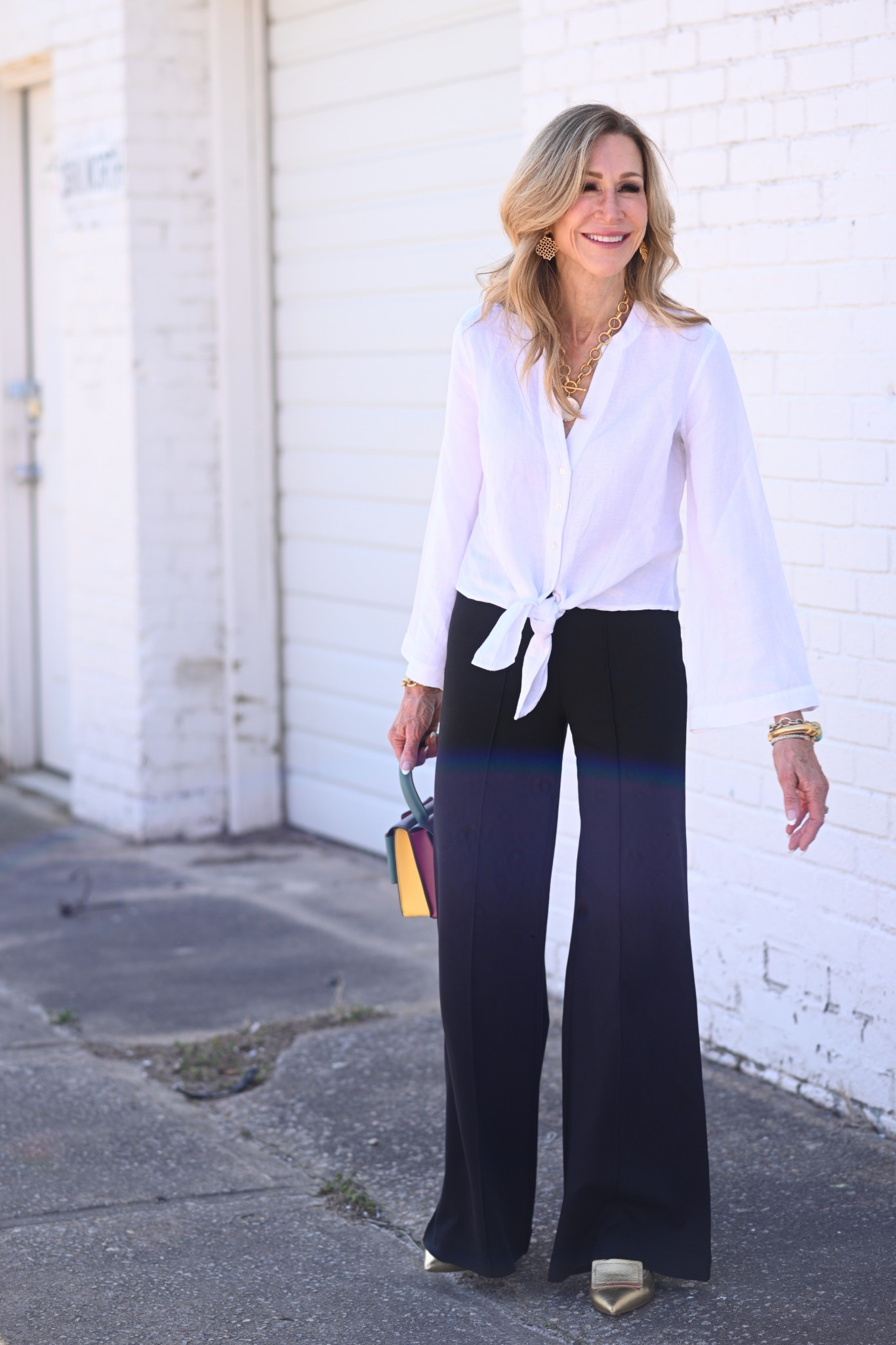 The most versatile black ponte knit pants from Boston Proper paired with a tie front white linen blouse!  My fabulous gold shoes are the perfect heel height for walking and looks great with the boxy bag from Boyy.  My necklace is from Julie Vos!


#LTKItBag #LTKSeasonal #LTKShoeCrush