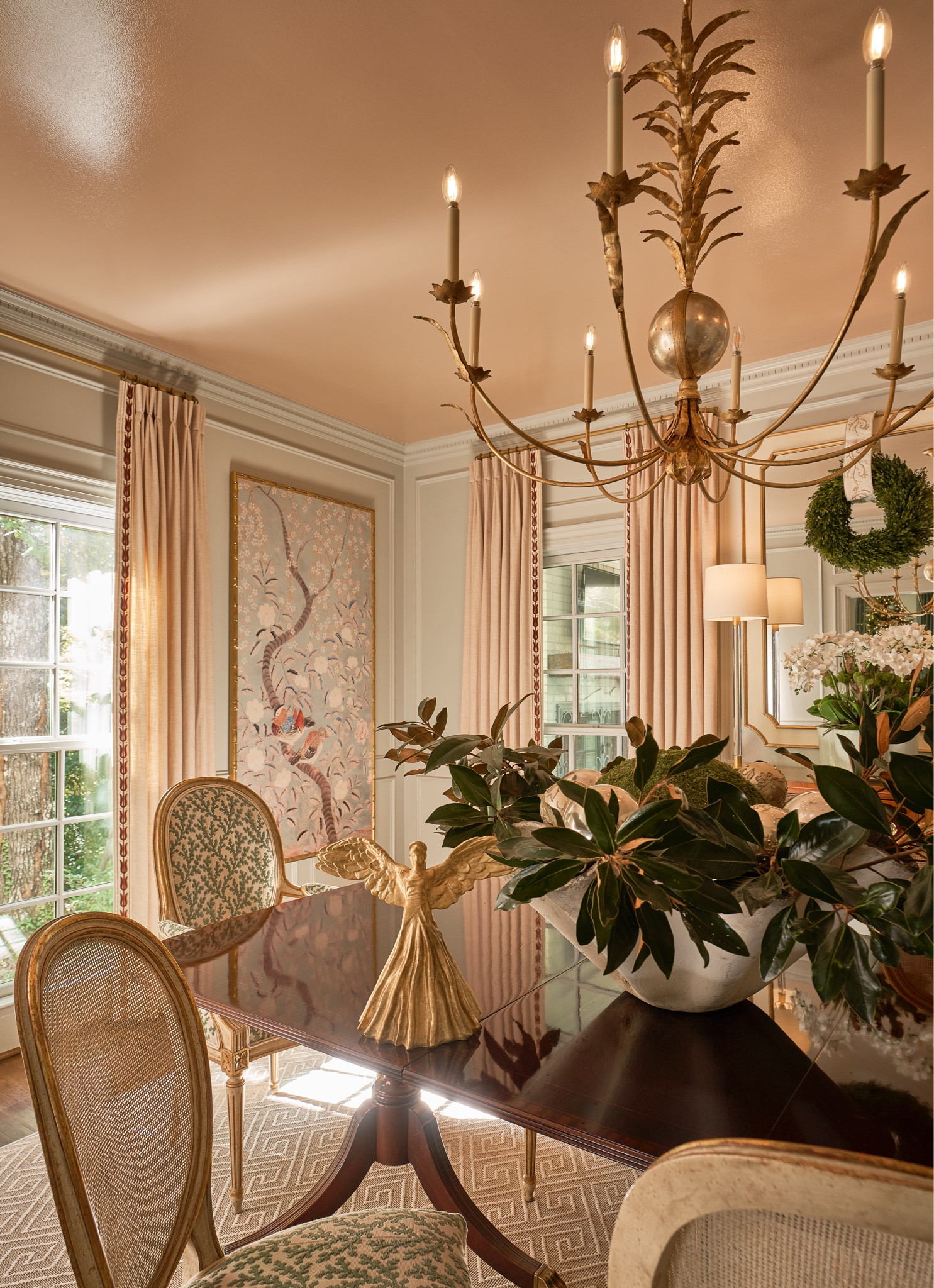 I found this elegant gilded angel that actually a tree topper but I love it as a tabletop decor in my dining room! It plays off my chandelier and the other gold accents. The magnolia leaves are cut from my yard - I’m all about not overthinking things! 

#LTKCyberWeek #LTKHome #LTKHoliday