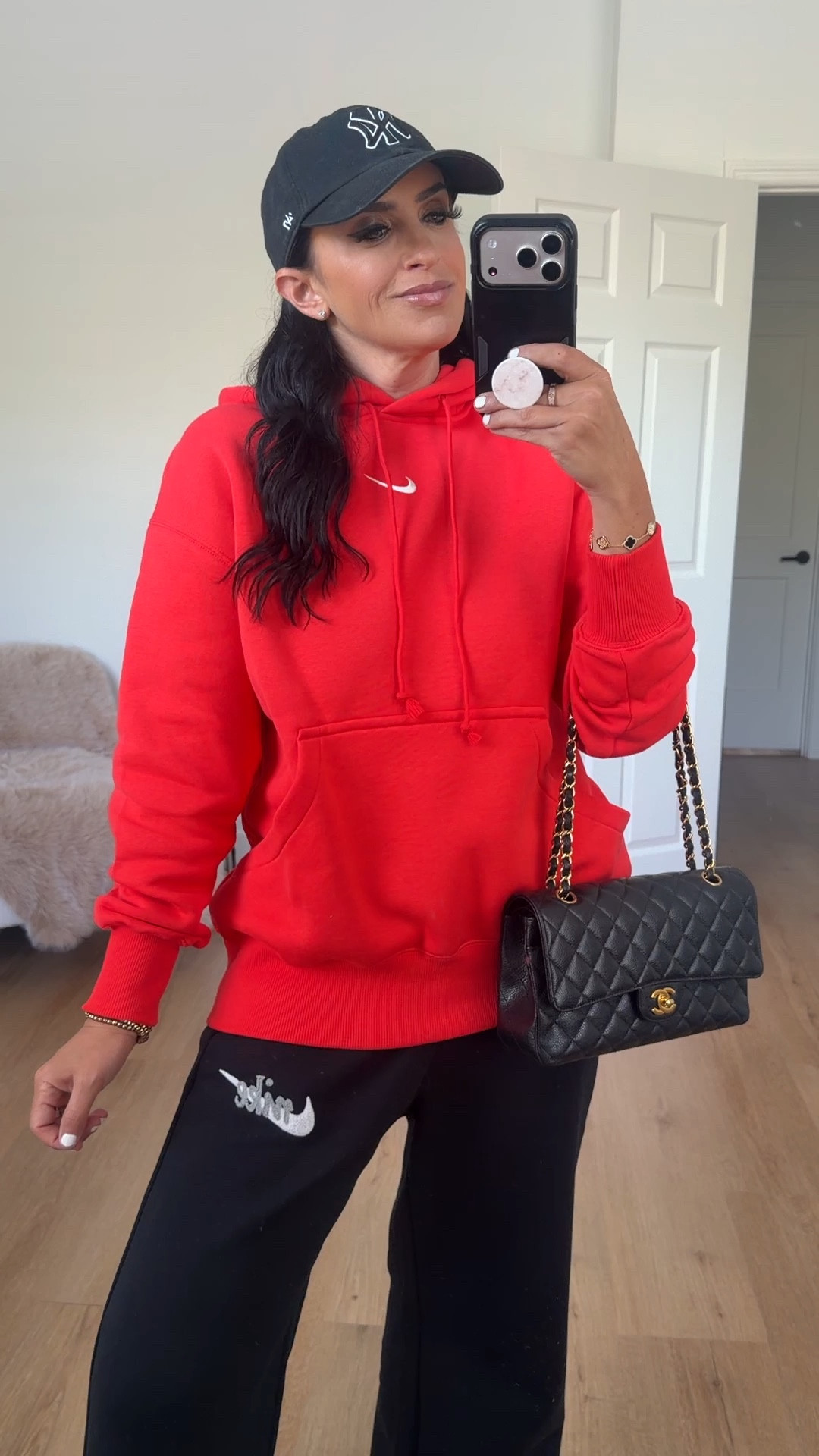 Nike sportswear phoenix fleece women’s oversized pullover hoodie in light crimson sail red wearing size small 

